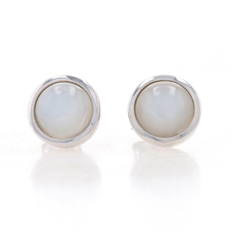 Metal Content: Sterling Silver

Stone Information
Natural Moonstones
Cut: Round Cabochon
Color: White
Diameter: 8mm

Style: Stud
Fastening Type: Butterfly Closures

Measurements
Diameter: 13/32