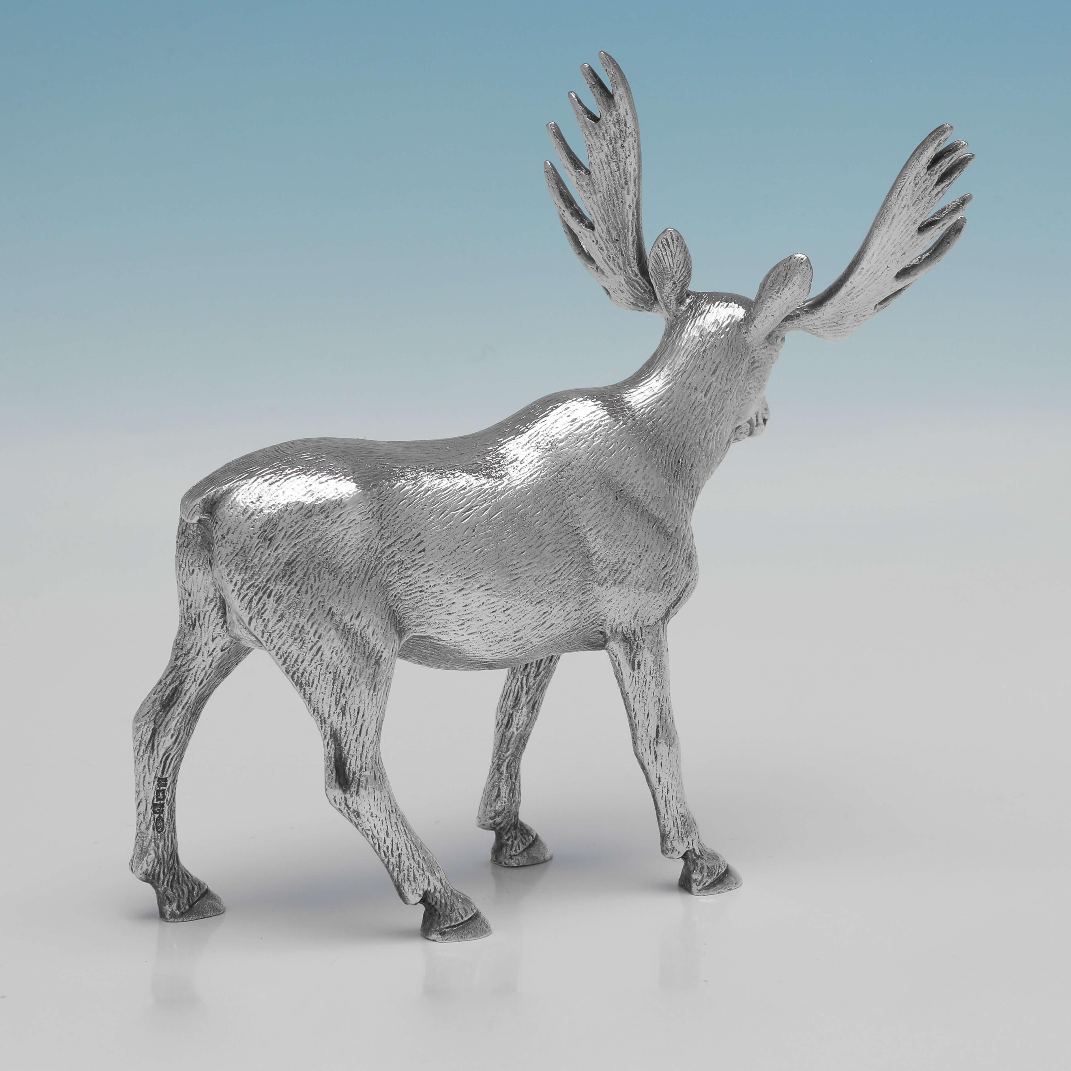 Hallmarked in Birmingham in 1973 by A. E. Jones, this handsome Sterling Silver Model of a Moose, is realistically cast. The moose measures 5.75