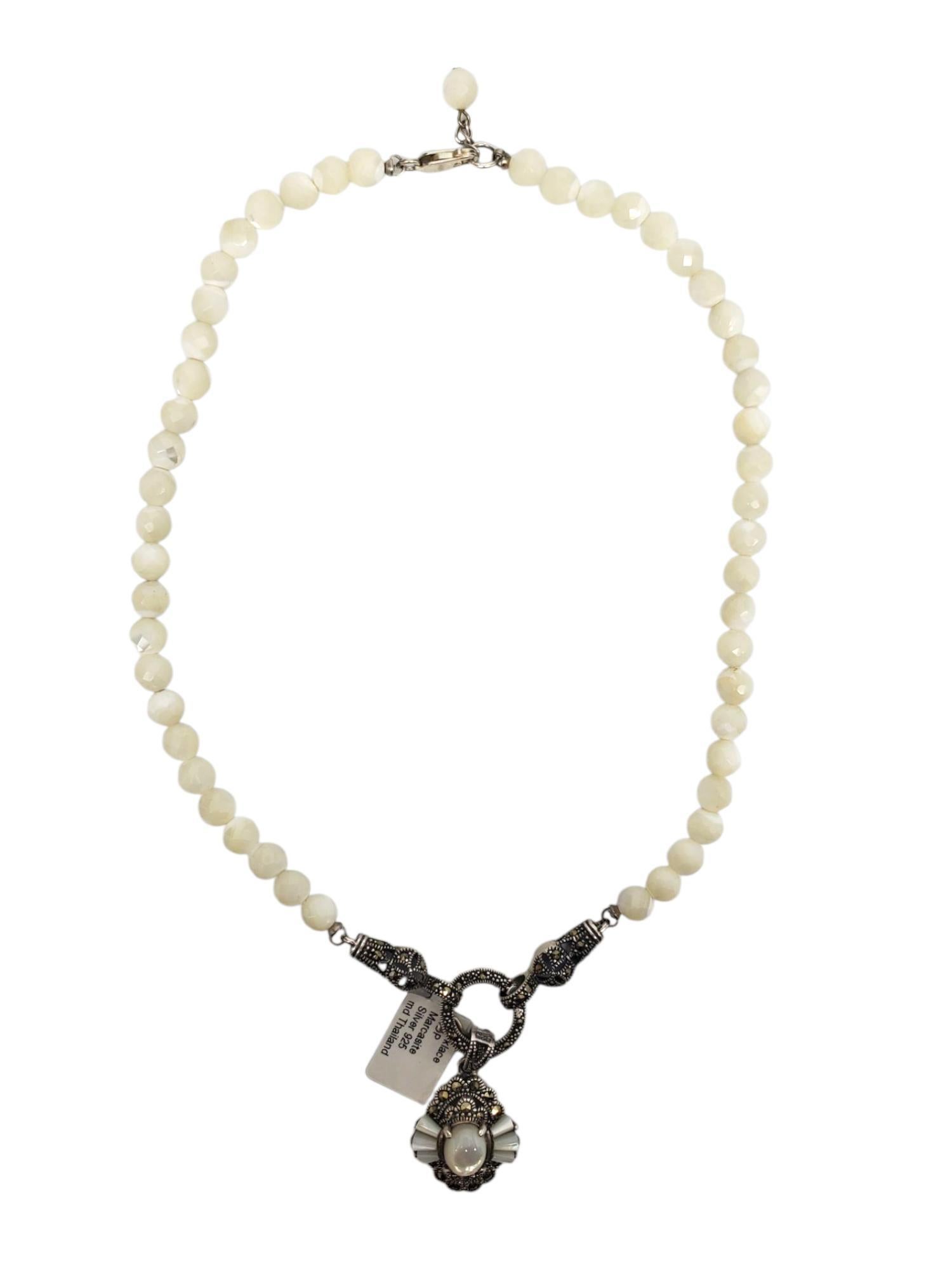 Sterling Silver Mother of Pearl & Marcasite Pendant Necklace -

This lovely sterling silver beaded necklace features a mother of pearl center (9.5 mm x 7.6 mm) filigree style pendant with marcasite accents.

Size: 16