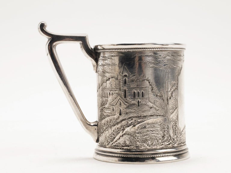 Sterling silver mug, embossed, and engraving, depicting monuments and architecture, USA, 1890.