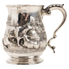 Sterling silver mug, Henry Holland London depicting grazing cows, 1856.