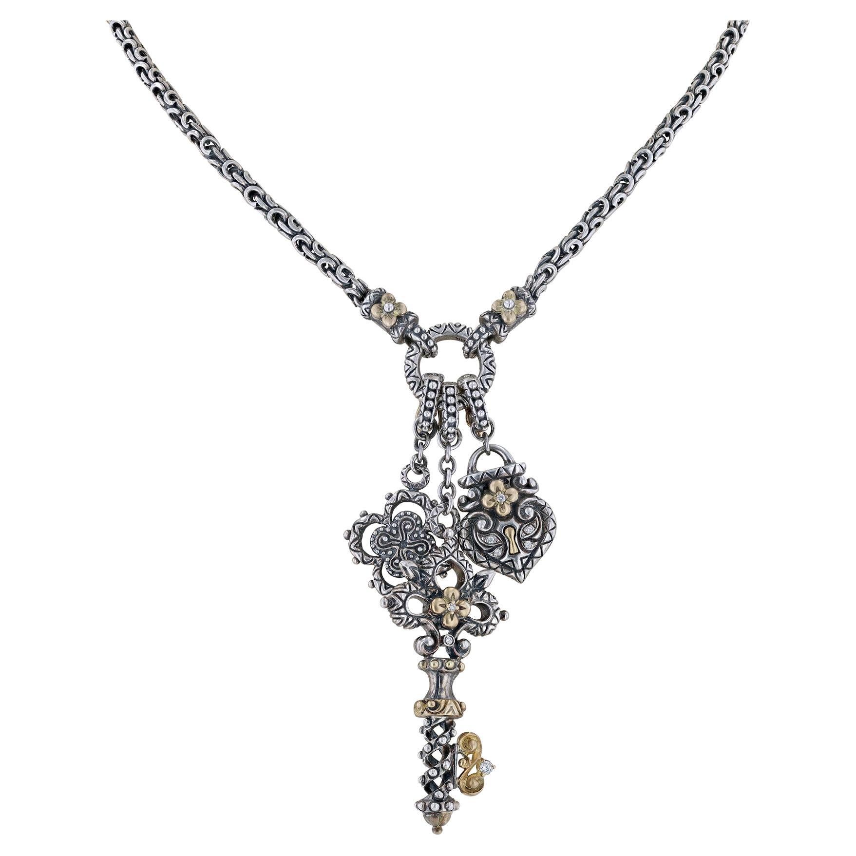 Sterling Silver Multi Charm Flower Key Lock Necklace For Sale
