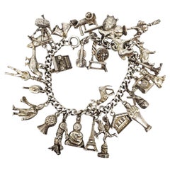 Vintage Sterling Silver Multiple Charms Bracelet #24483