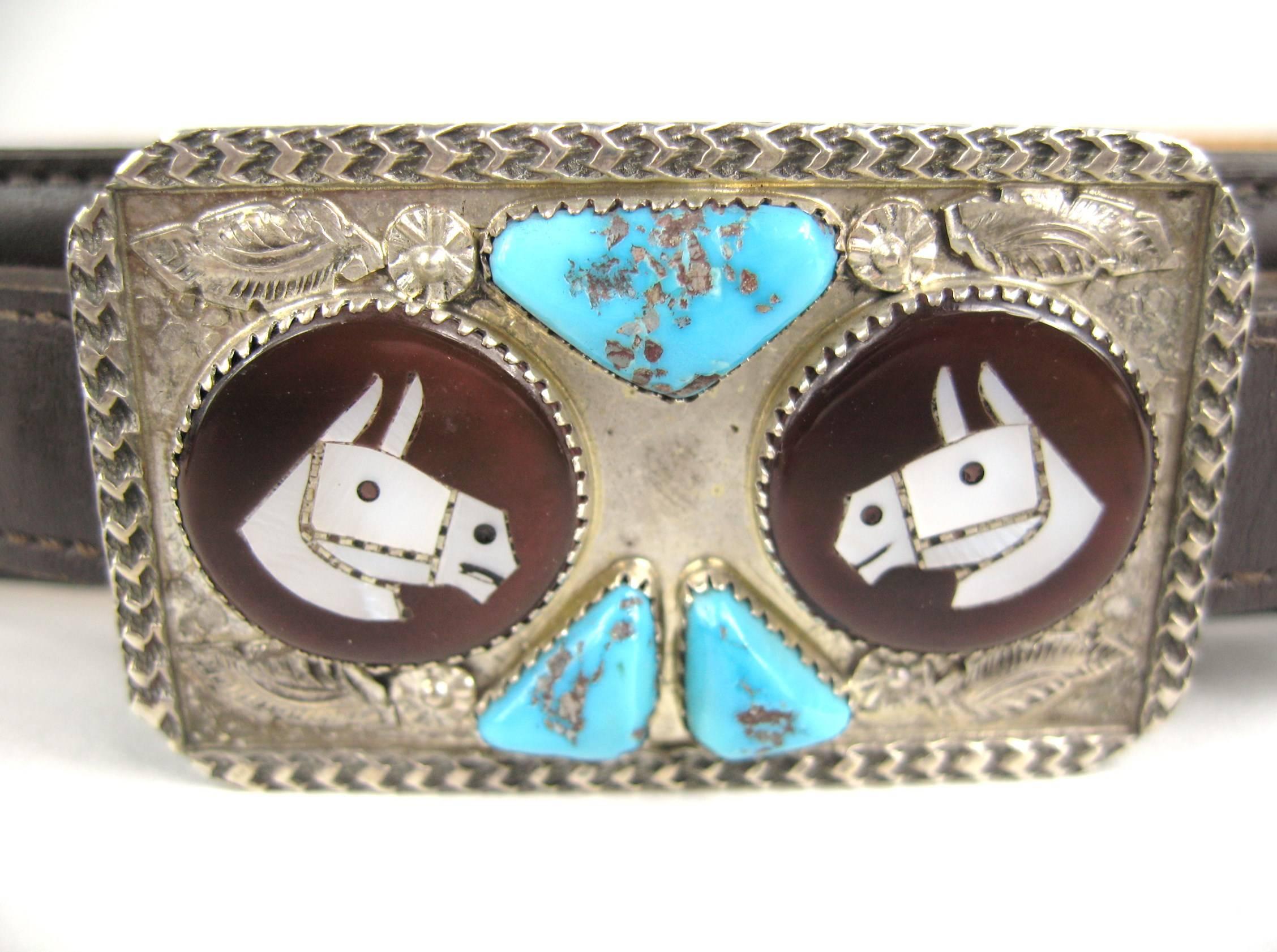 Here you have a Sterling Silver Multi Gemstone Horse Belt Buckle with features Turquoise, Jet and Mother of Pearl on a Leather Dan Post Belt. Belt is a 30. Buckle measures 2.25 inches wide x 1.40 inches. Belt measures 1.15 inches wide x 36.25 inches