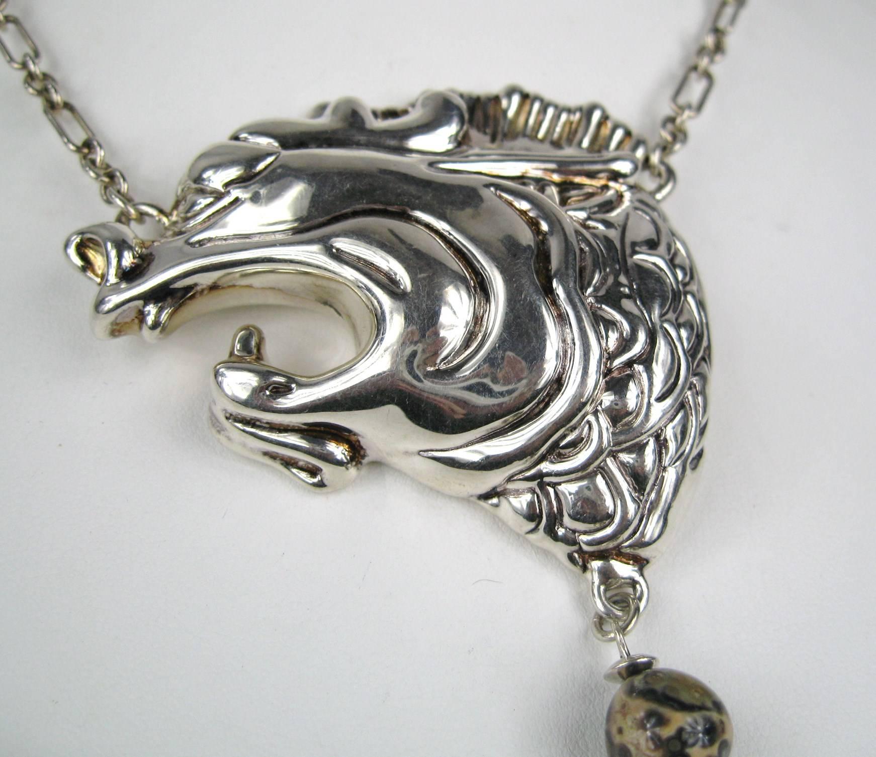 FREDERIC JEAN DUCLOS ON WAX Hand Signed. Stunning Hand Crafted piece new, never worn! This is from the 1980s. Looks like a Griffon or a dragon, large sterling silver link chain with 9.80 mm bead. Hangs down to 40 inches. Sterling silver head