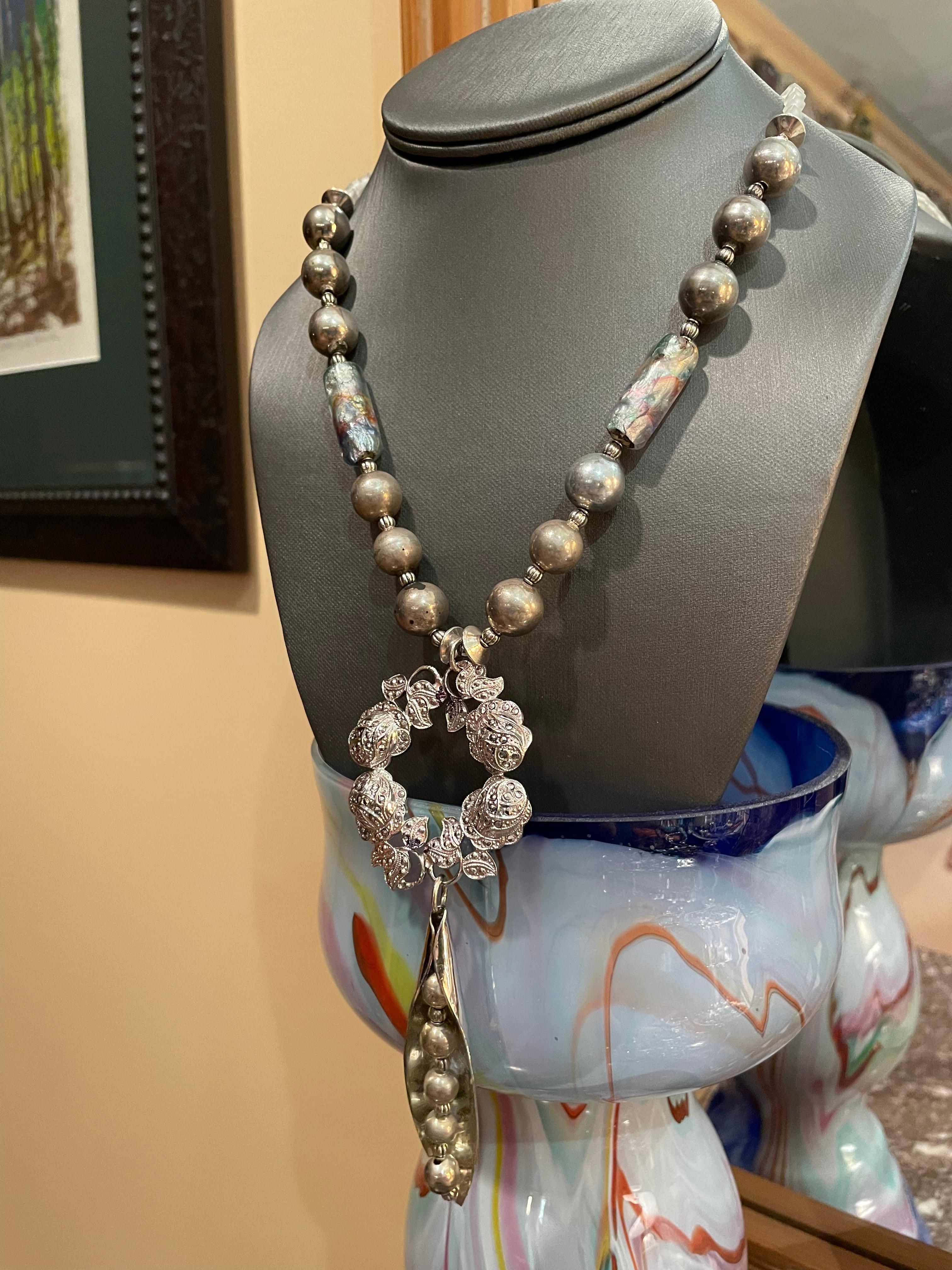Women's Sterling silver necklace of vintage brooches, sterling beads and Murano glass . For Sale