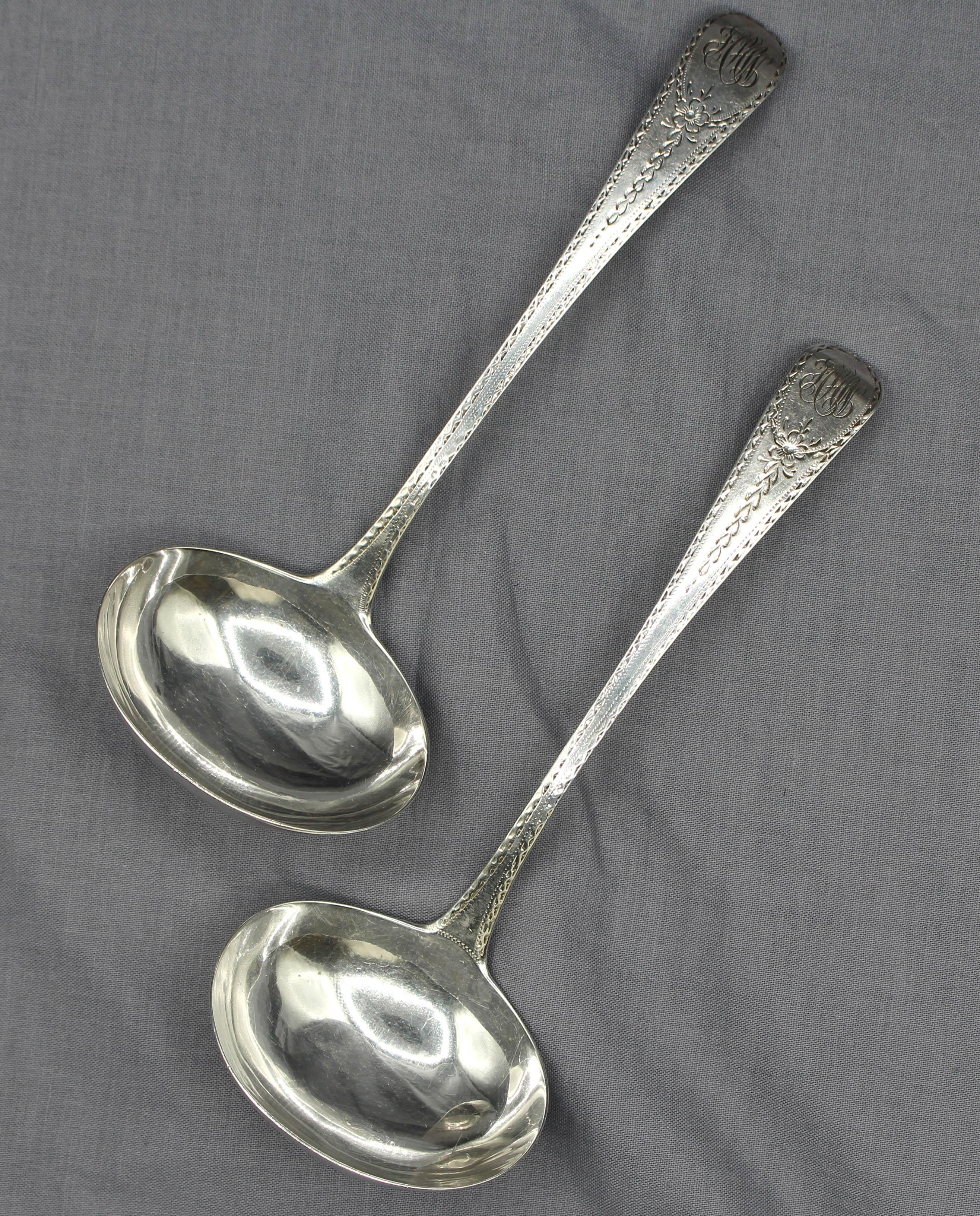 London, 1812, pair of Old English engraved pattern gravy ladles by John Lias. Sterling silver; feather edge. Later monogram. 2.80 troy oz. 
Measurements: 6 5/8