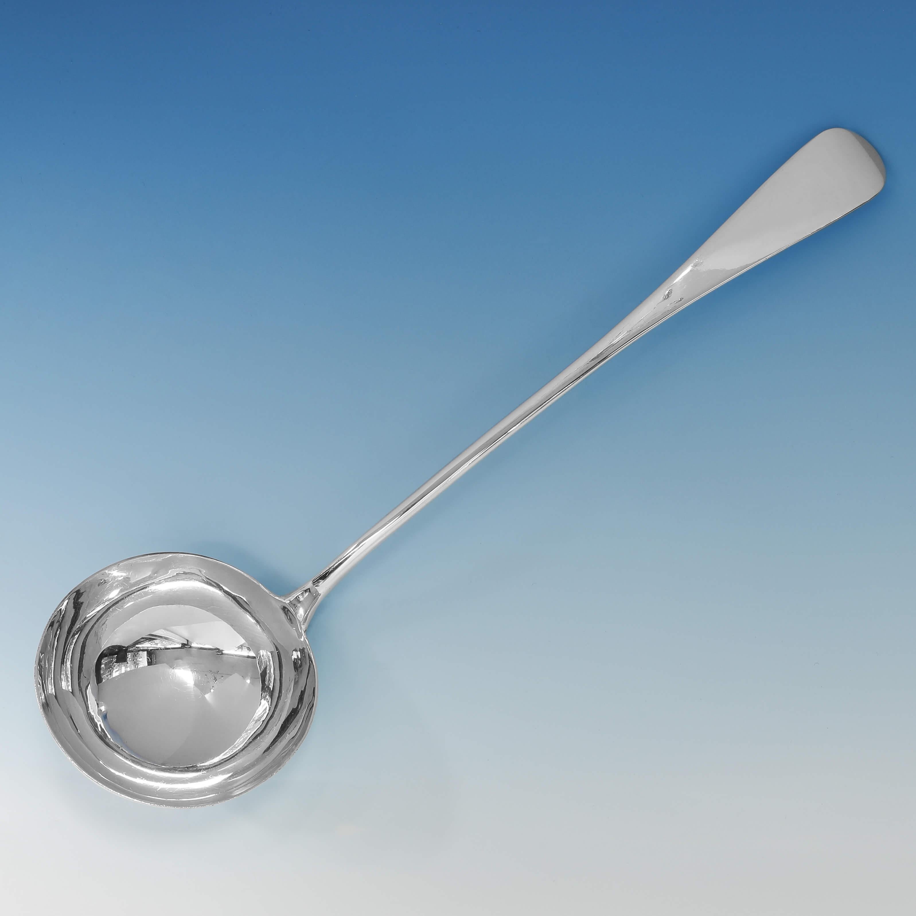 Hallmarked in London in 1861 by George Adams, this handsome, Victorian, antique sterling silver soup ladle, is in 'Old English' pattern. The soup ladle measures 13.5