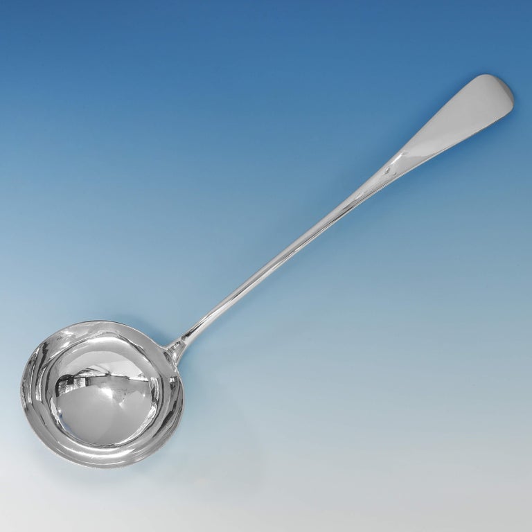 Hallmarked in London in 1861 by George Adams, this handsome, Victorian, antique sterling silver soup ladle, is in 'Old English' pattern. The soup ladle measures 13.5