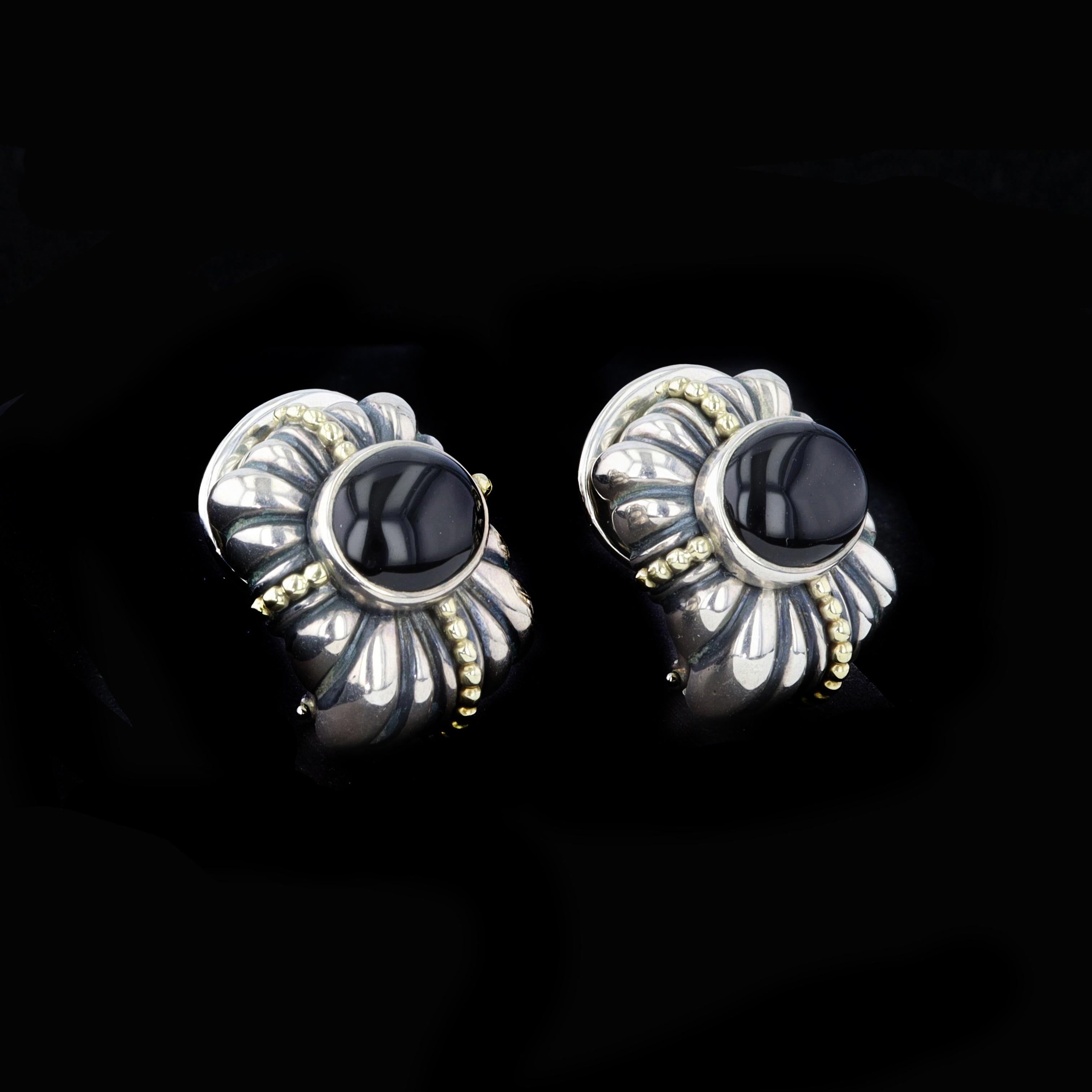 Unique and retro sterling silver onyx earrings feature beautifully detailed yellow gold beading. These on the ear style earrings have a lever back closure.

