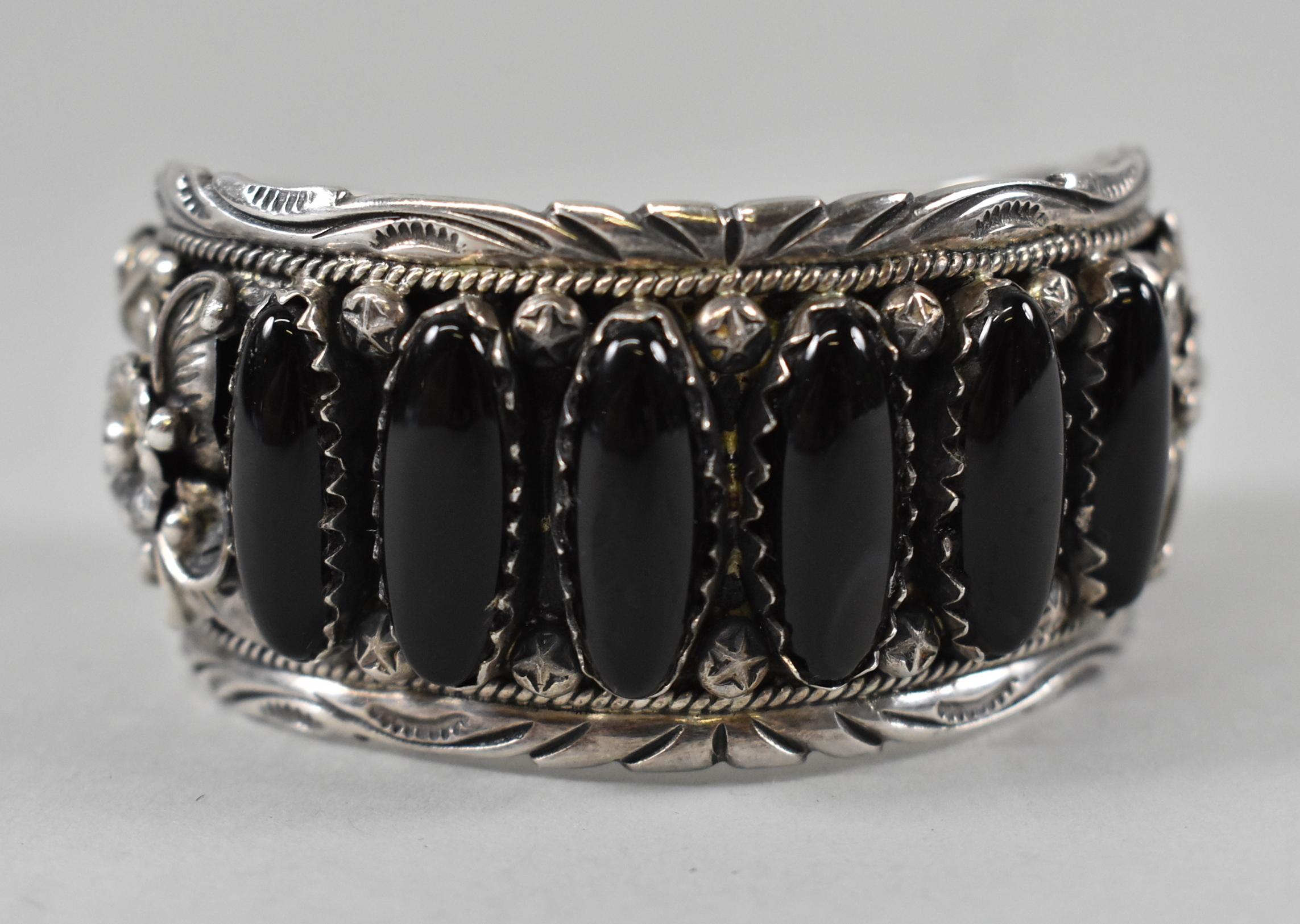 Sterling silver and onyx Navajo cuff bracelet marked P. R. Measures: 1 1/4