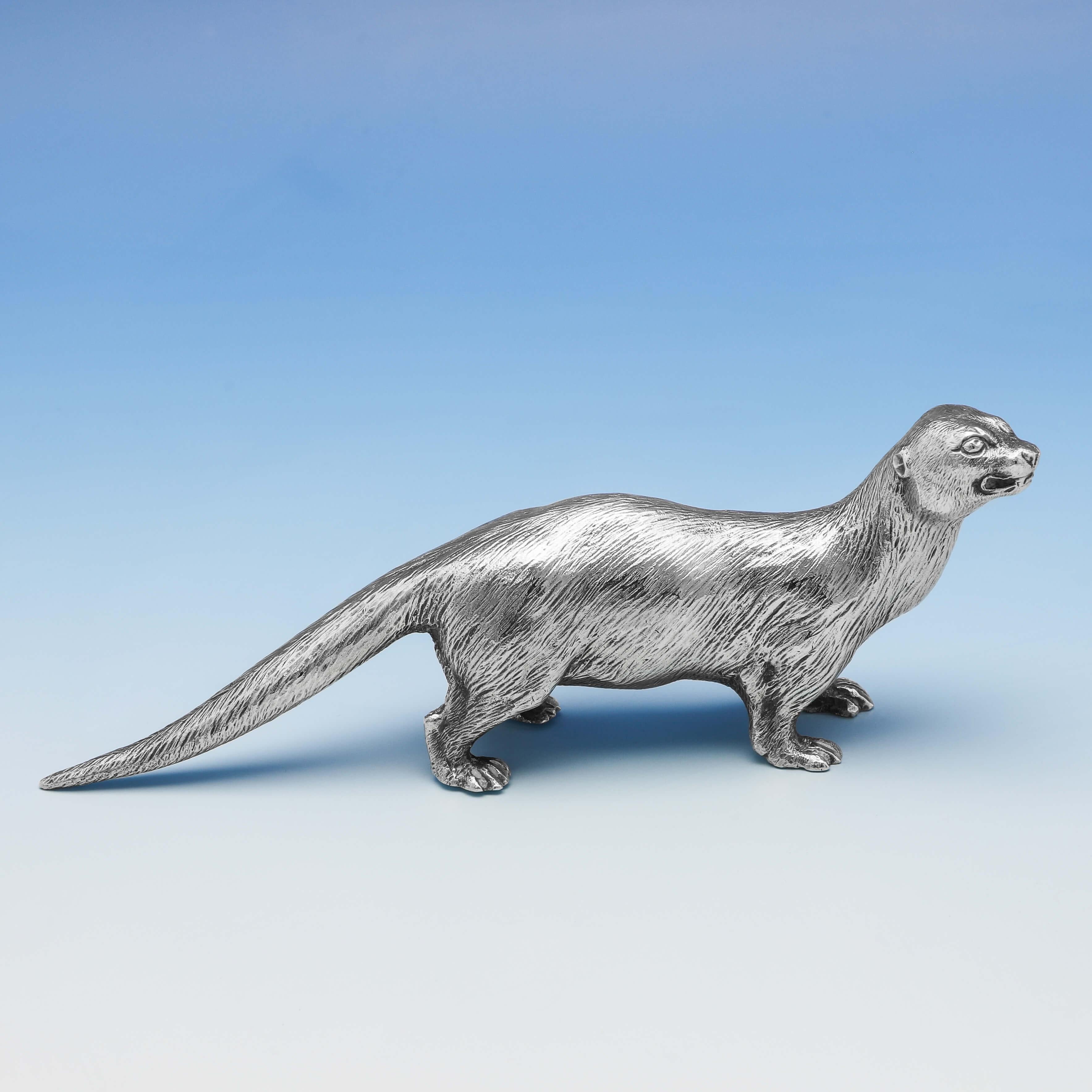 Hallmarked in London in 1970 by Richard Comyns, this delightful sterling silver otter model, is realistically made, and measures 2