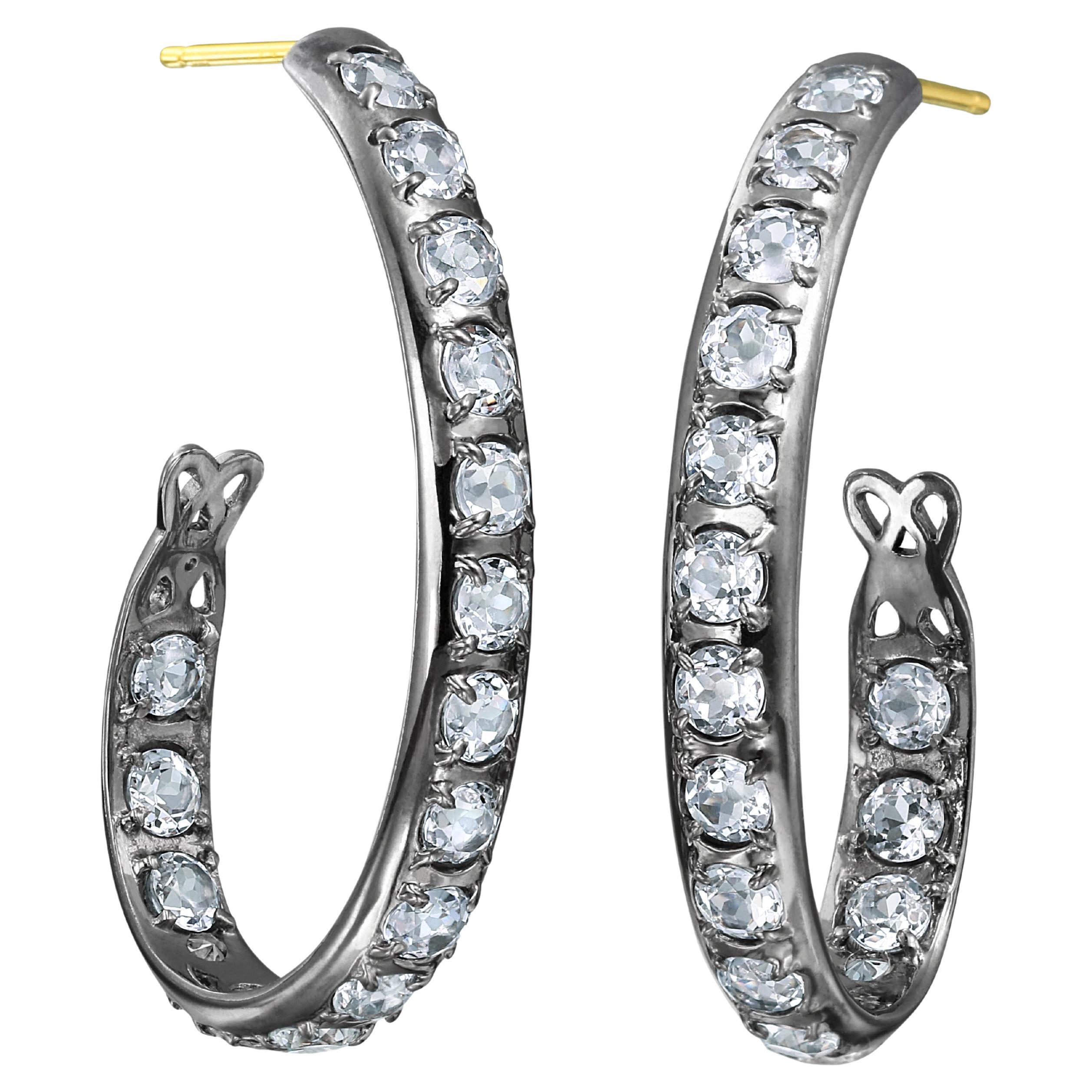 Sterling Silver Oval Hoop Earrings with White Topaz For Sale