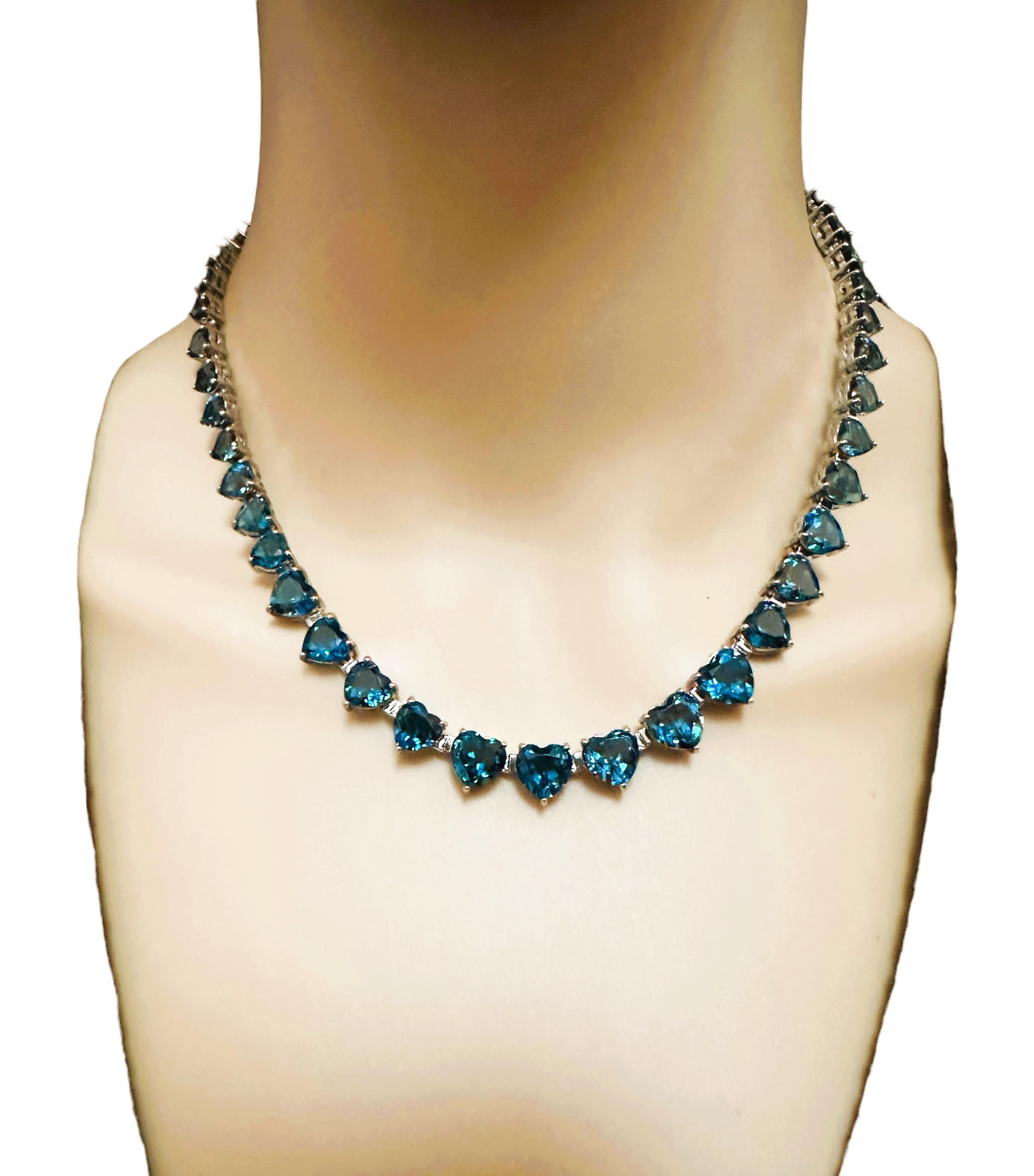 This is just in time for Valentine's Day or an Anniversary or Birthday.  The beautiful London Blue Topaz stones are graduated  The largest being 8.3 x 7.5 mm down to 4.4 x 3.5 mm.  My guess is that this is over 50 cts of Topaz.  The necklace is