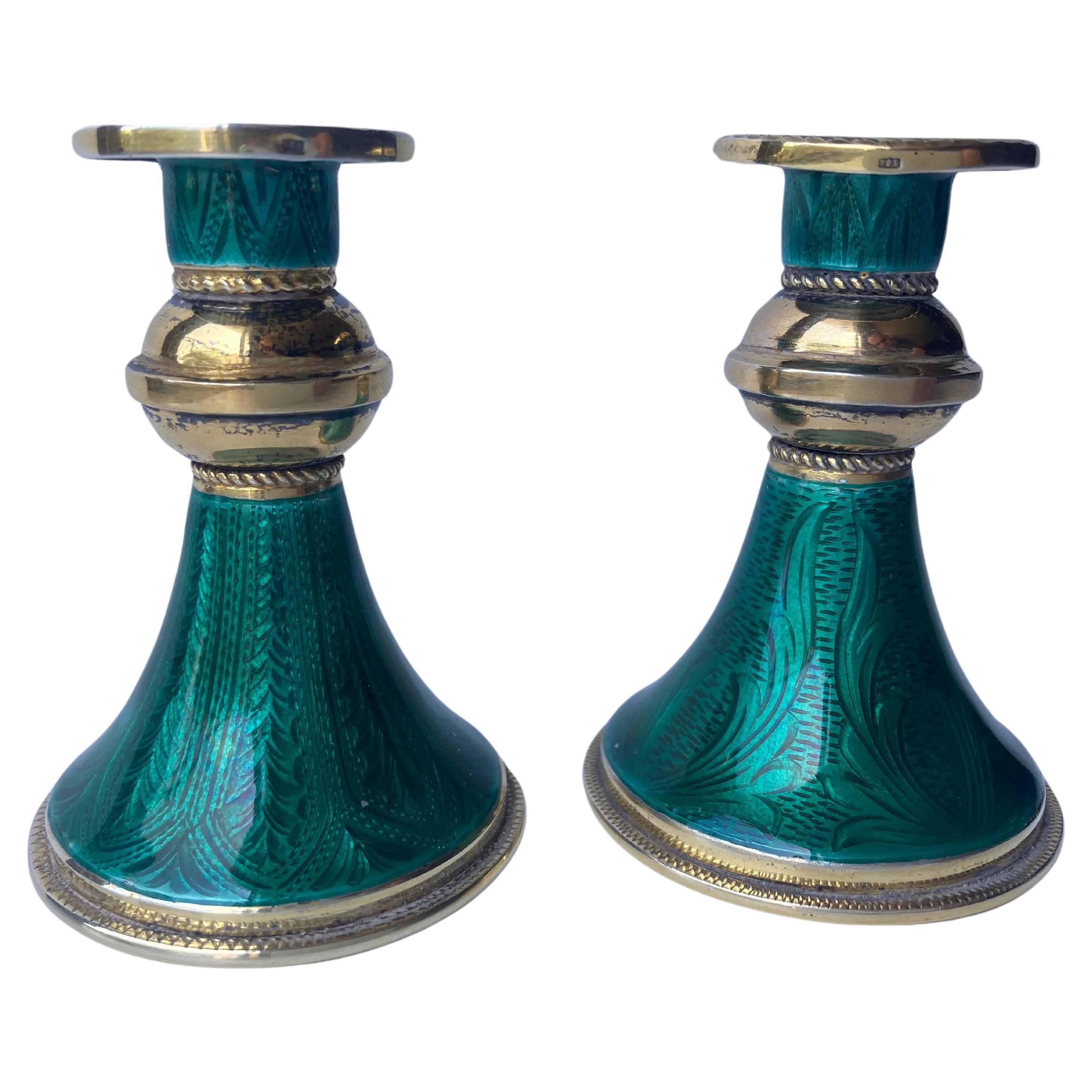 Sterling silver pair gilded and enamel green guilloche candlesticks marked 925. For Sale