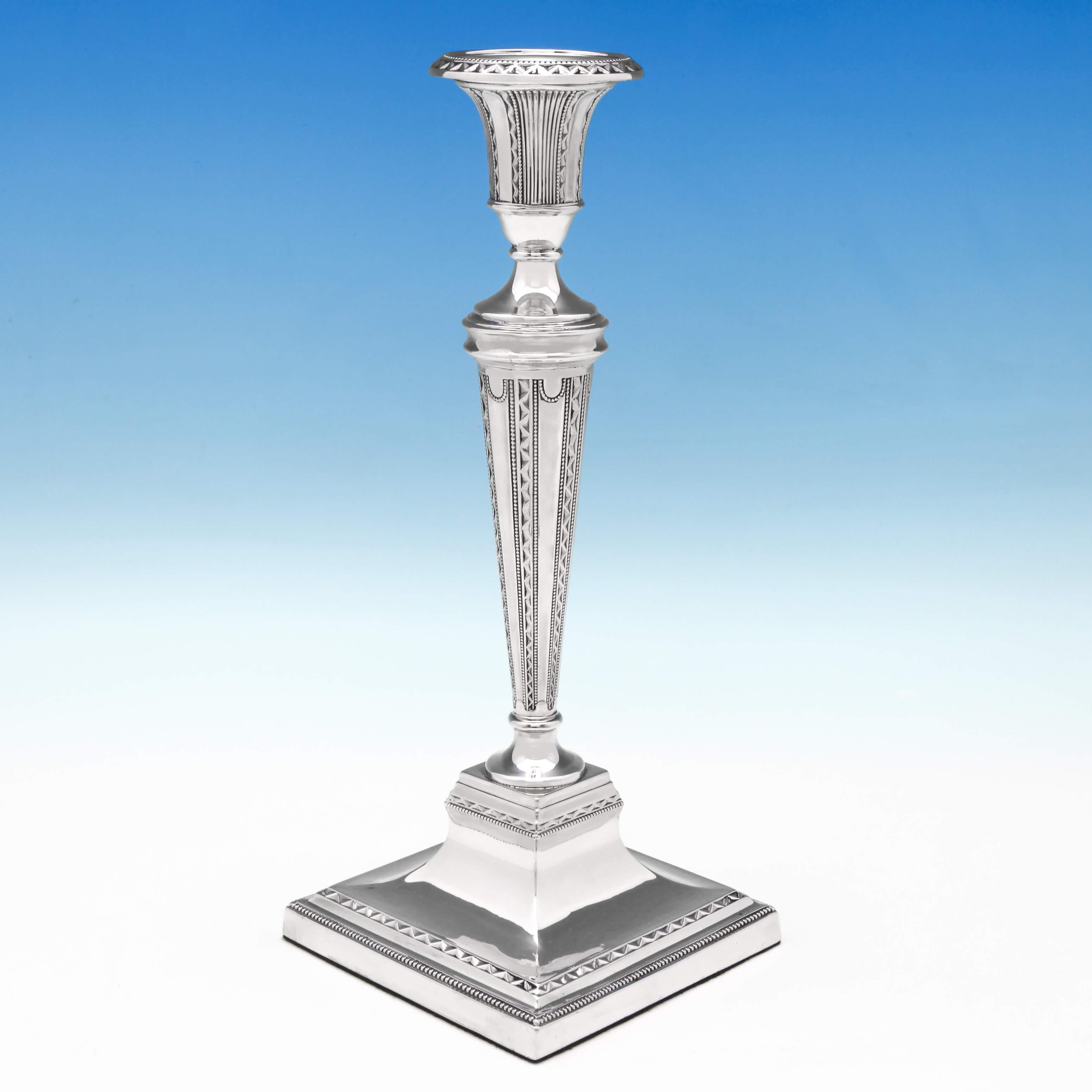 Hallmarked in London in 1893 by Turner Bradbury, this very attractive, Victorian, antique, sterling silver pair of candlesticks, feature zig zag and bead decoration, and removable sconces. Each candlestick measures 11 inches (28cm) tall, by 4.25