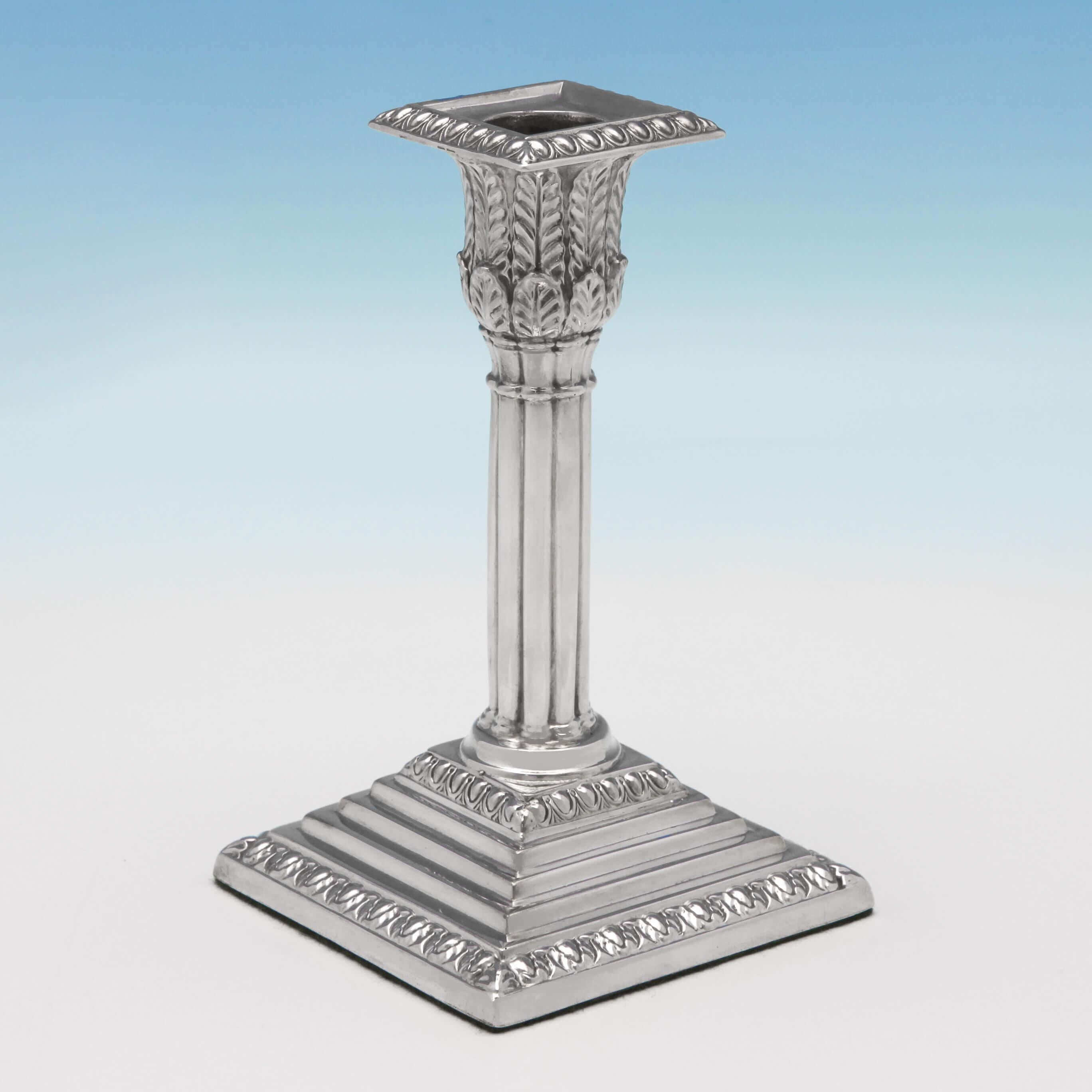 Hallmarked in Sheffield in 1874 by James Kebberling Bembridge, this attractive, Victorian, antique sterling silver pair of candlesticks, stand on square stepped bases, and feature bamboo columns, acanthus leaf decoration to the capitals, and