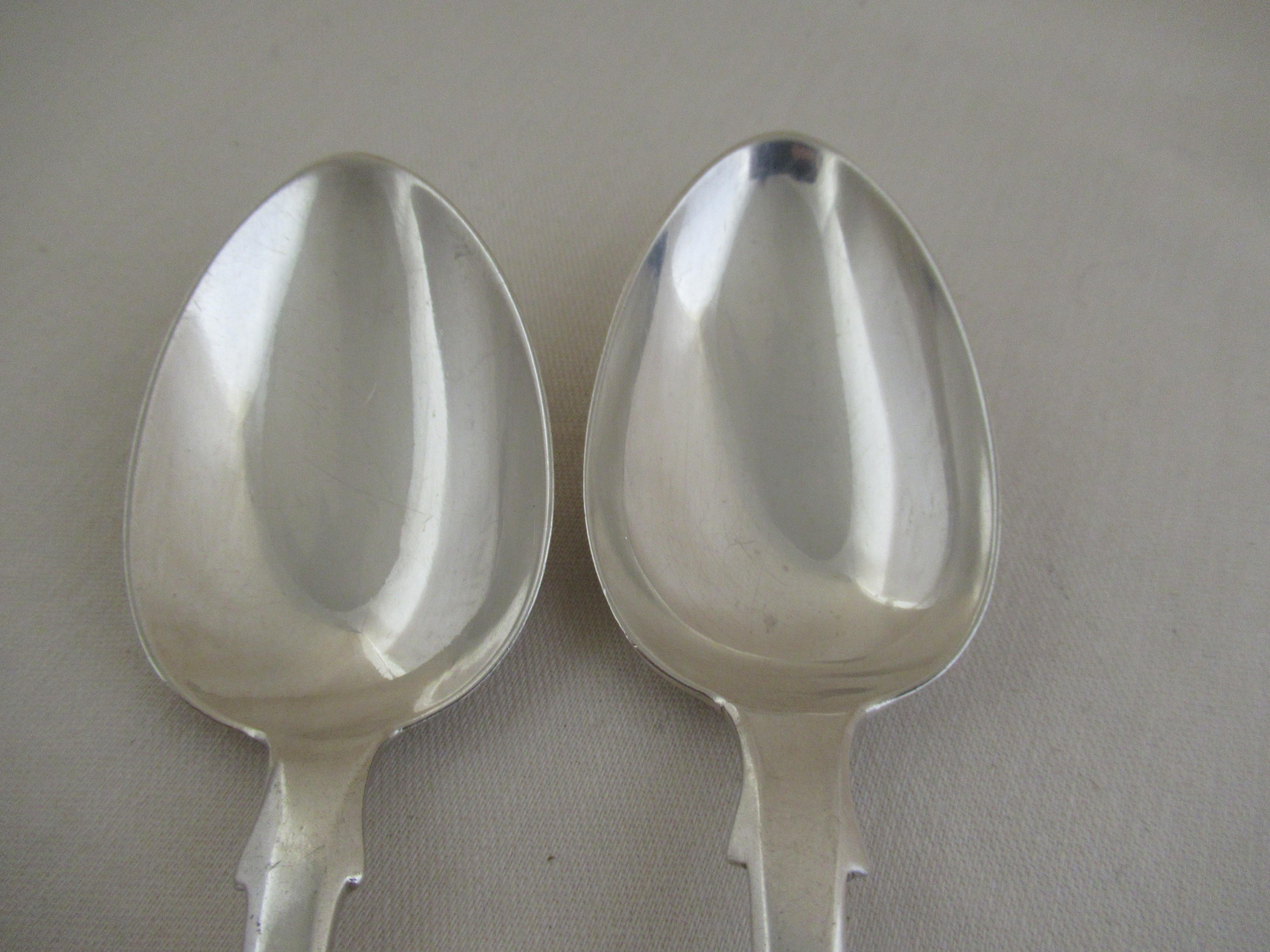 Sterling Solid Silver - Pair of Fiddle Pattern Dessert Spoons
Made in 1844, ( 179 years old), by William Eaton.
A full set of hallmarks applied by the London Assay Office:- 
 Leopard`s head - London Assay Office mark.
 Lion - Sterling silver
