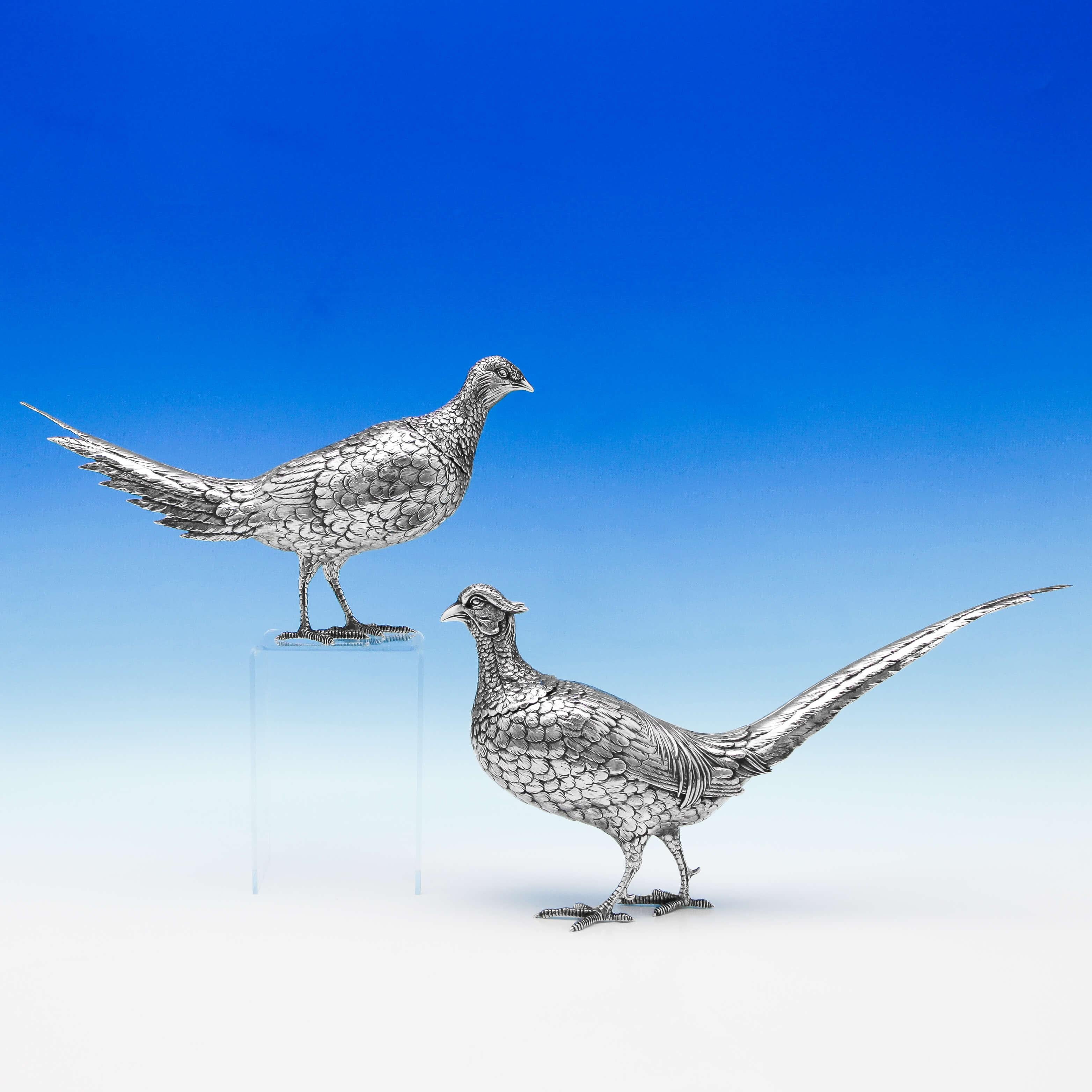 Carrying import marks for London in 1921 by Berthold Muller, this very handsome pair of George V, sterling silver pheasants, are beautifully modelled and feature removable heads. The female measures: 7