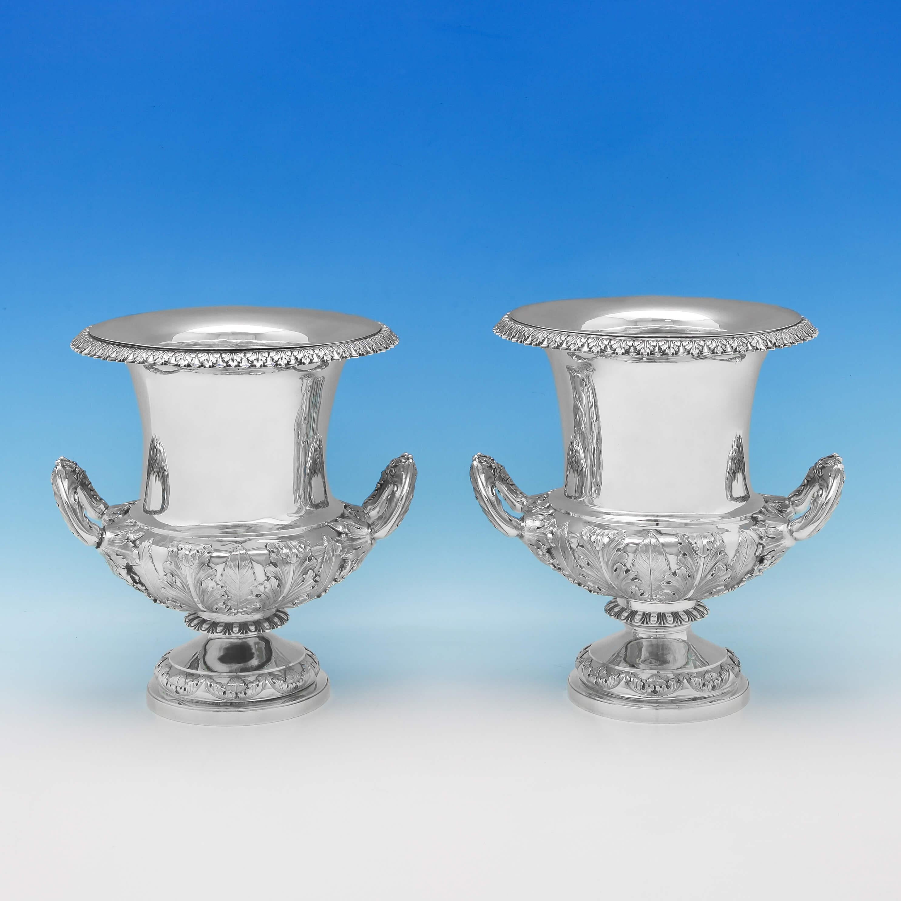 Hallmarked in Edinburgh in 1841 by William Marshall, this superb pair of Antique, Victorian, sterling silver wine coolers are Campana shaped, featuring wonderful chased acanthus decoration and removable liners. Each wine cooler measures 10.5 inches