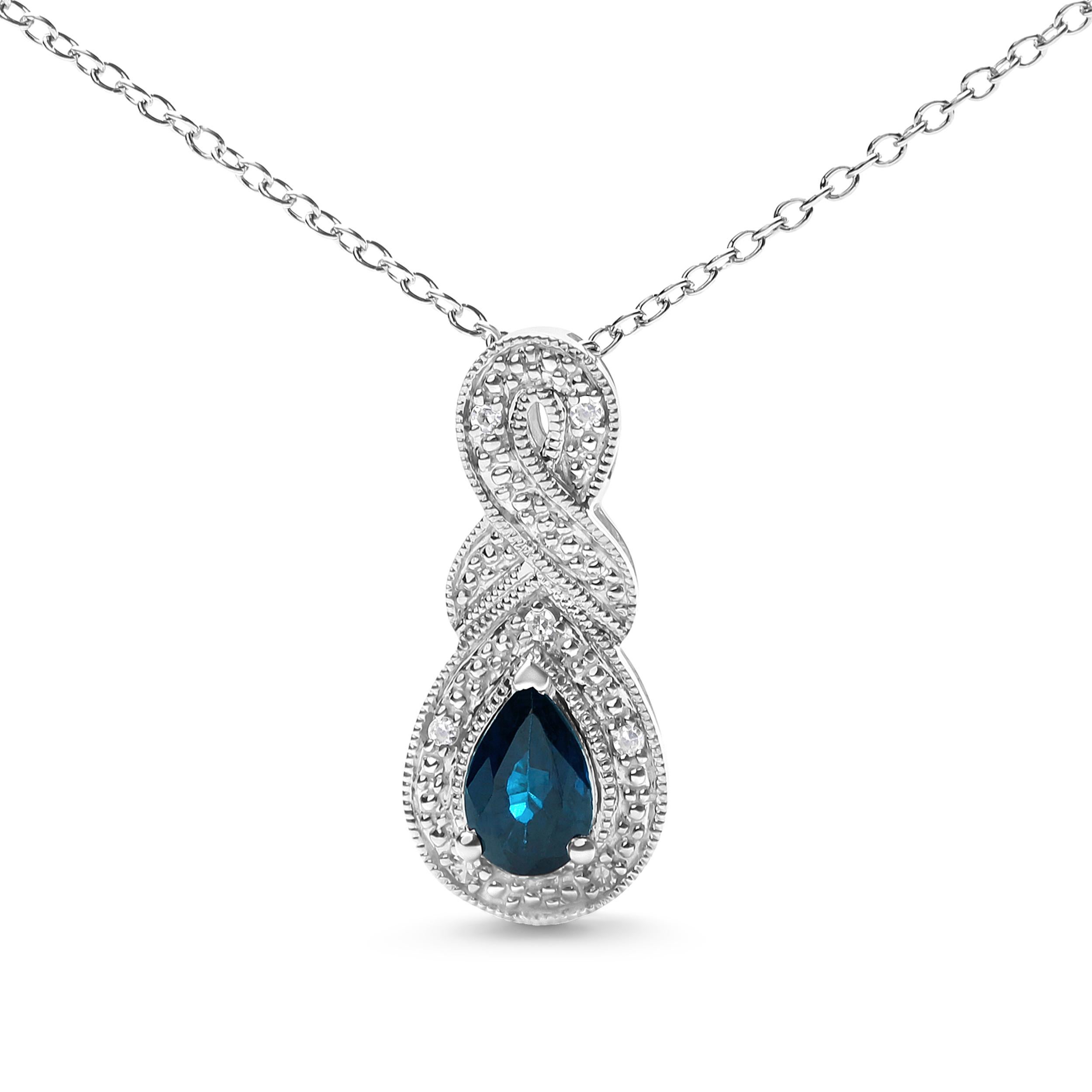 Elevate any outfit with this stunning .925 sterling silver sapphire and diamond accent drop pendant necklace. The pear-shaped blue sapphire, measuring 6 x 4mm, is a natural heat-treated gemstone that radiates a deep blue hue. The delicate 18