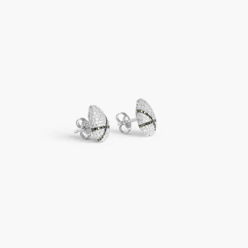 Sterling silver Pebble white diamond stud earrings with black diamonds

These stud earrings are formed in an irregular pebble shape and covered in a pave of white and black diamonds. This sterling silver design features a crossover pattern laid out