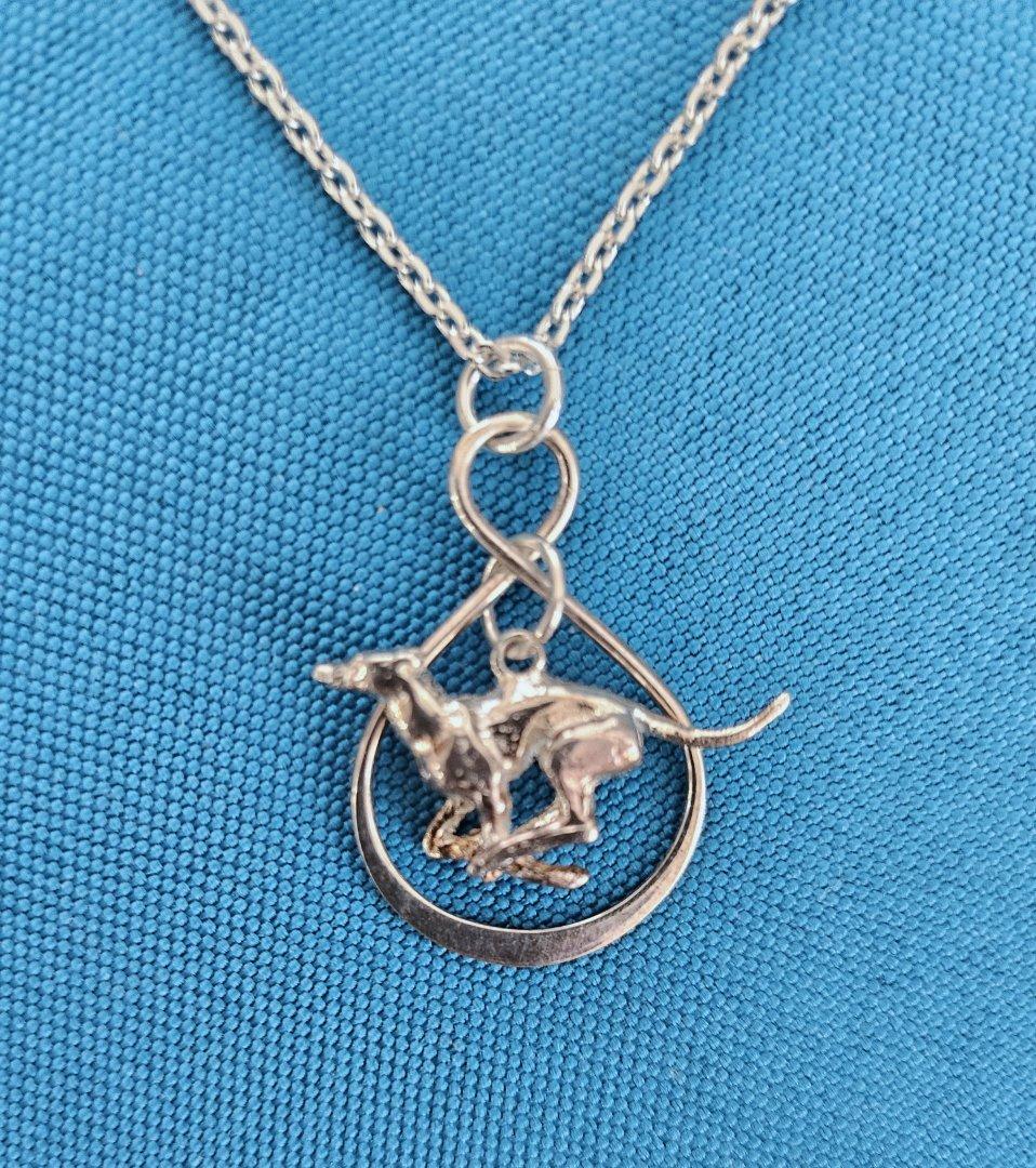 Sterling Silver Pendant Necklace with Sculptural Greyhound, Stamped. Vintage.
This is a unique pendant necklace perfect for the greyhound lover. The chain and the infinity are stamped. 
May need a little cleaning.
IMPORTANT INFORMATION FOLLOWS;
