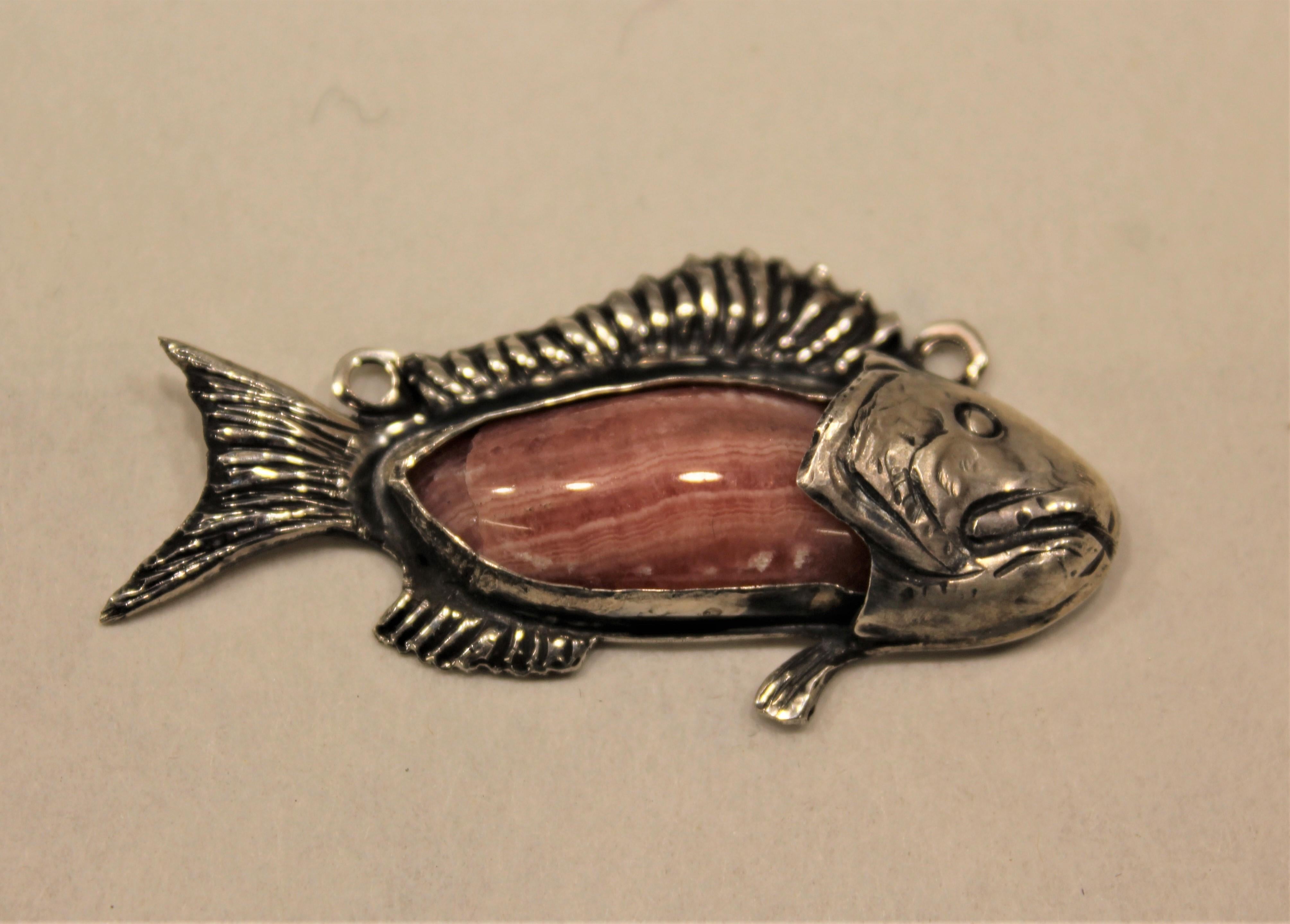 The “Pink Fish” pendant is part of our jewelry collection. All our sterling silver pieces of jewelry are handmade: it means that none is like the other. As a matter of fact, our aim is to create unique products with a high artistic value. Indeed,