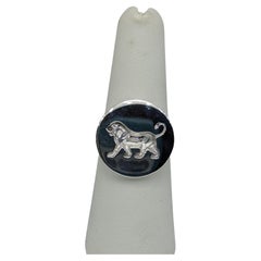Signo de plata de ley León andante de Persépolis Cera  talla 7