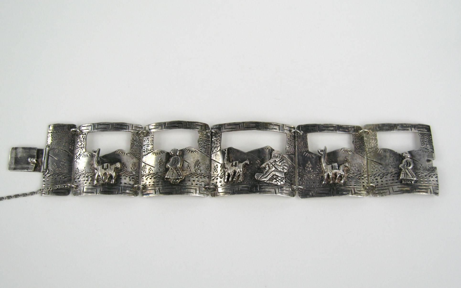 A stunning Peruvian paneled Sterling Bracelet, Safety chain attached. Slide-in clasp, nice and tight. Paneled with Camels and People Hallmarked on the back. Measures 7.25 inches long Panels are 1.34 inches x 1.22 inches. This is out of a massive