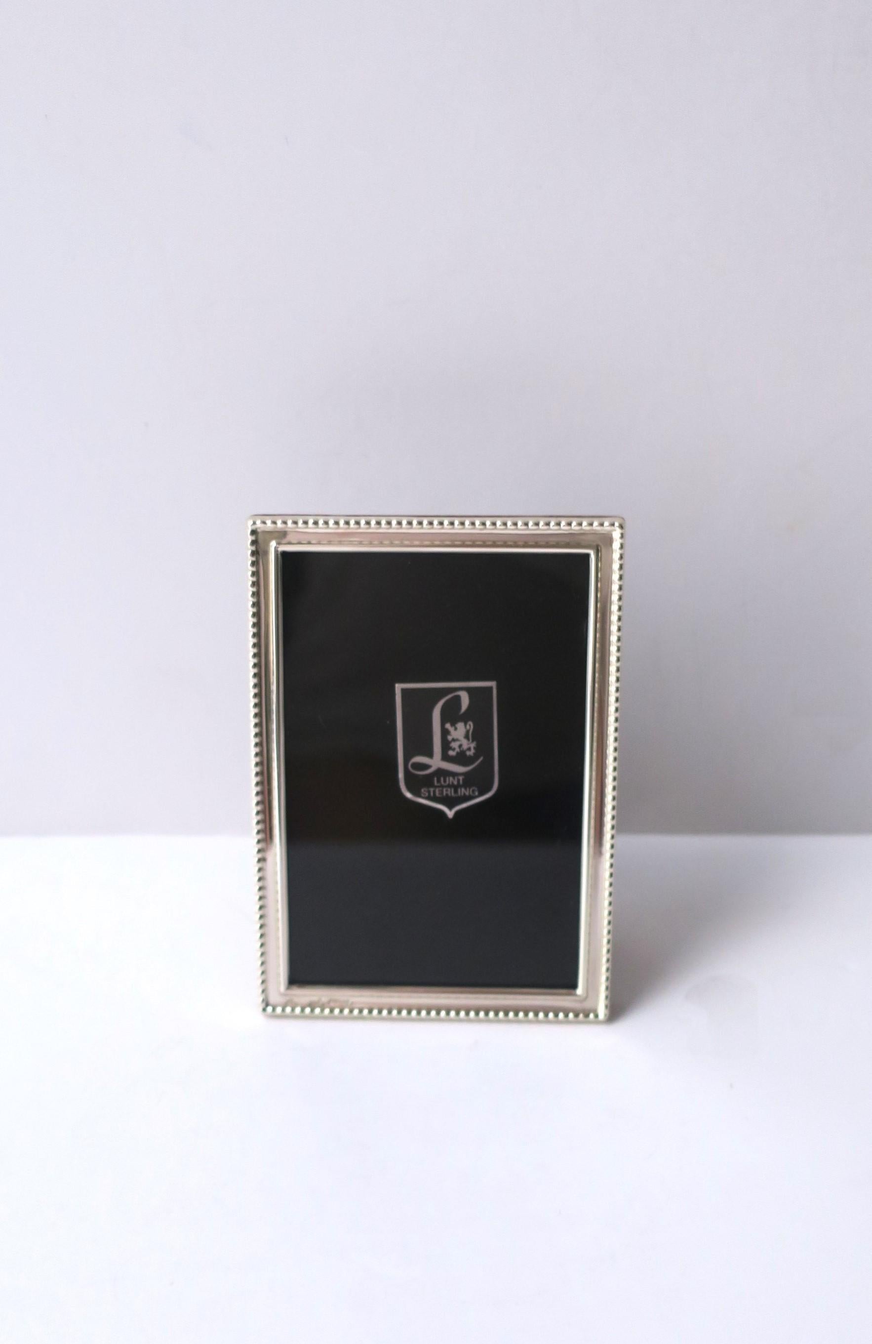 A small, elegant sterling silver picture frame, circa mid-20th century, Spain. A beautifully made sterling silver picture frame which can sit vertical or horizontal (as demonstrated), with a clear lacquer finish requiring no polishing. Marked '925',