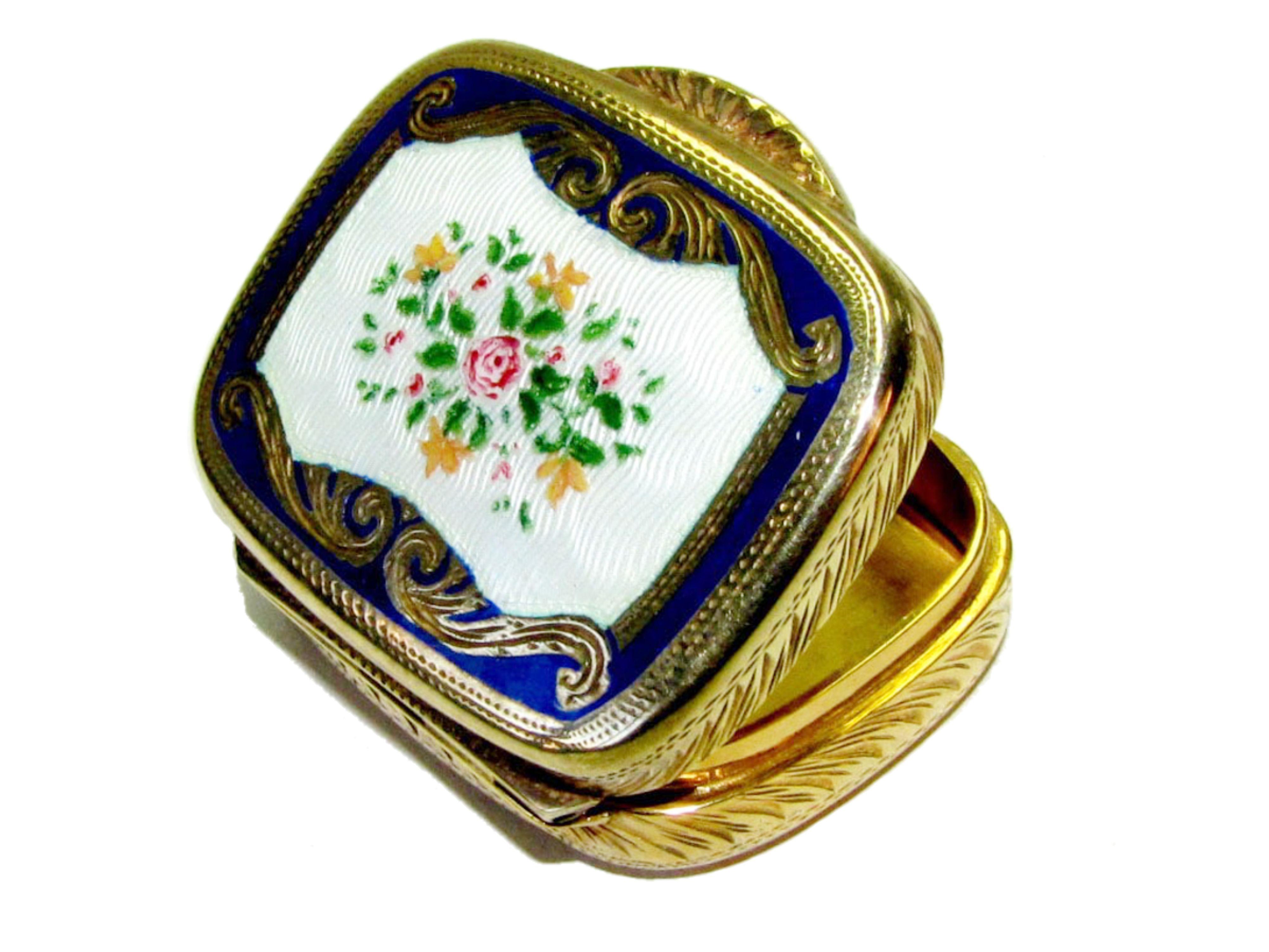 Rounded rectangular pill-box in 925/1000 sterling silver gold plated with translucent fire enamel on guilloche with hand painted bouquet of flowers and hand engravings . Size cm. 3,6 x 4,4 x 1,2 Weight gr. 46.Designed by Franco Salimbeni in 1974 and