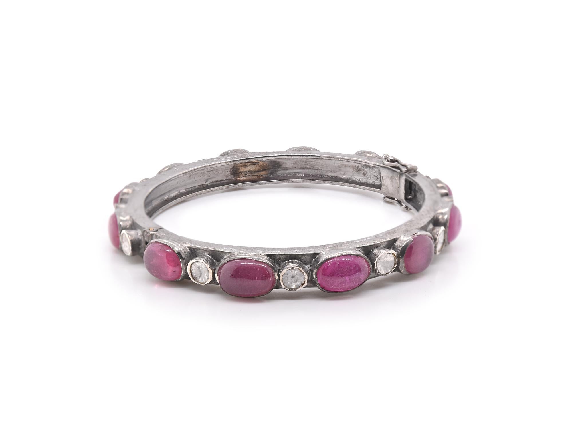 Designer: Custom
Material: Sterling Silver
Diamonds: 13 Slices 
Color: G-I
Clarity: I2-I3
Tourmaline: 12 Cabochon cut
Dimensions: bracelet measures 7.43mm in width
Size: 7.5
Weight: 45.2 grams
