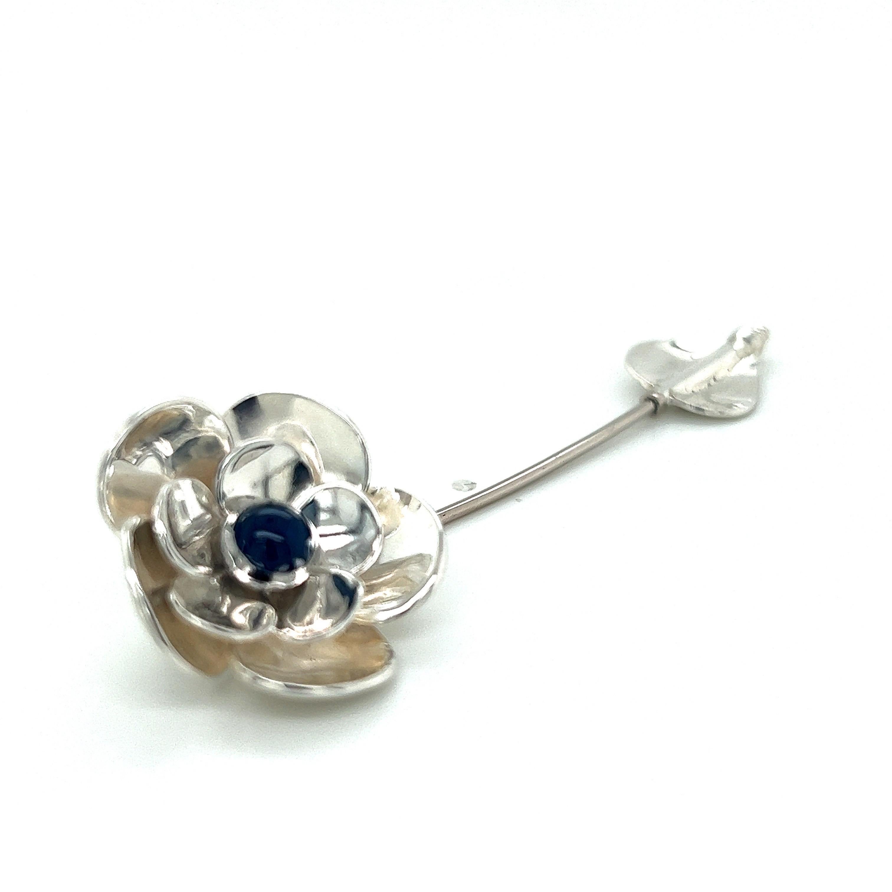 Sterling Silver, Platinum, And 14k White Gold Flower Stick Lapel Pin With Cabochon Sapphire With Screw-On Bottom Clutch In The Shape Of a Leef