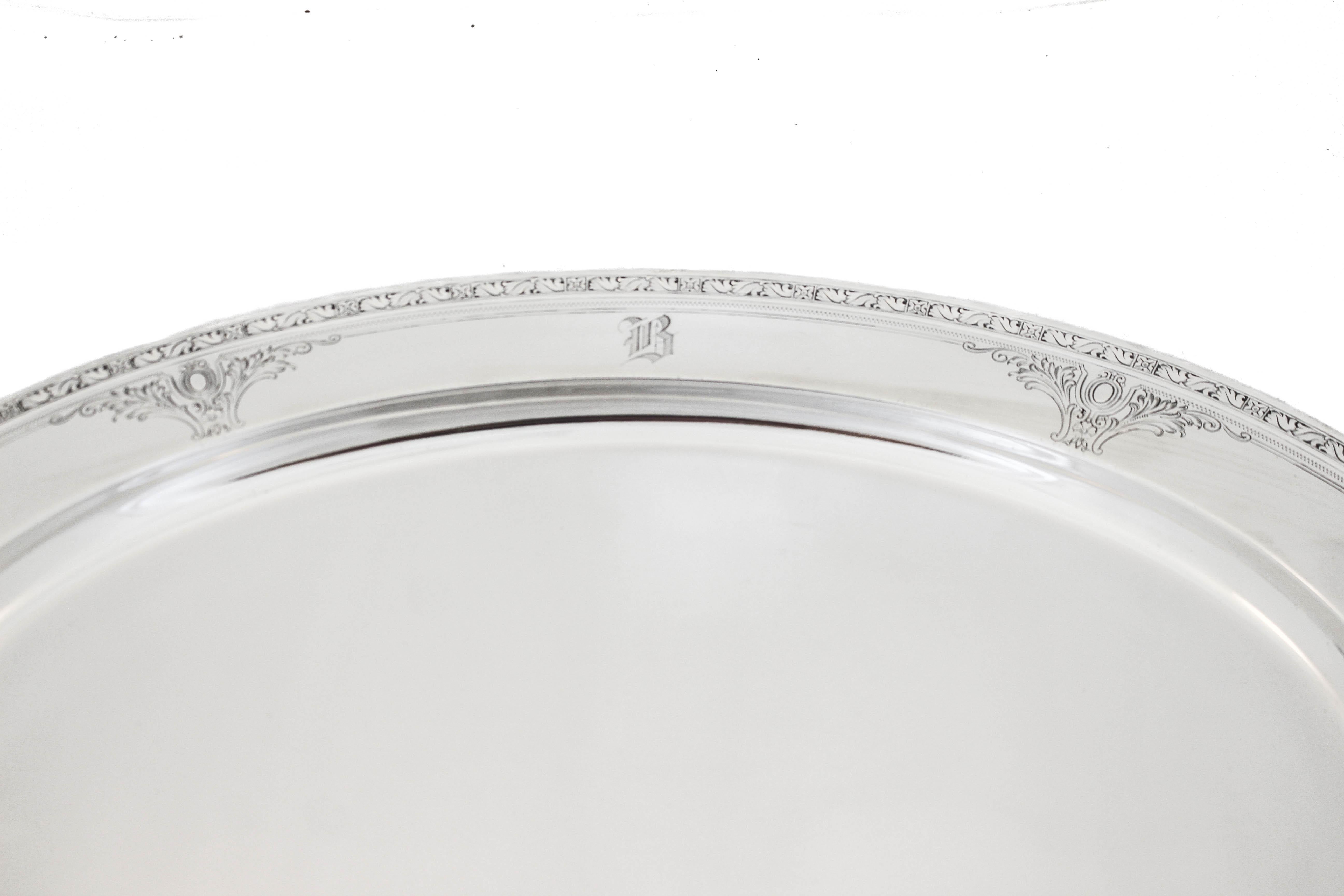 Being offered is a sterling silver platter by Gorham Silver in the “Cinderella” pattern hallmarked 1925.  It has a lovely etched pattern around the edge (2”) with four medallions — two on each side.  The center is completely flat so it’s ideal for