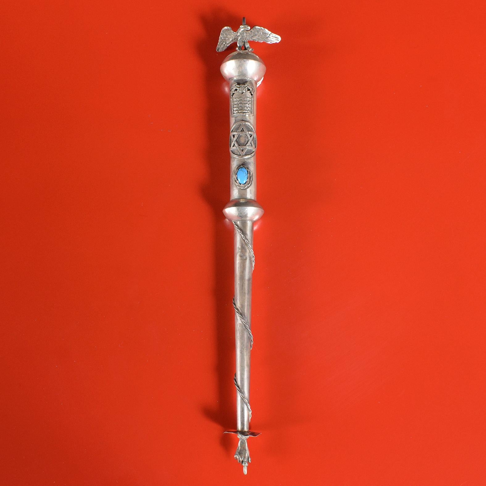 This sterling silver Torah pointer (Yad) from Israel has a hammered finish on the handle and a sterling silver chain on the end to hang on the Torah. The tip has an index finger pointing, making it easier for the reader to follow along. A beautiful