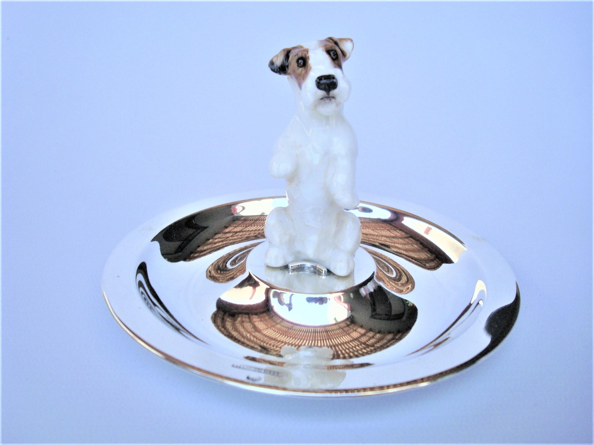 Sterling Silver Jack Russel Jewelry dish.
Lovely Jack Russel Dog made of porcelain mounted over a sterling silver Jewelry dish / plate.
 