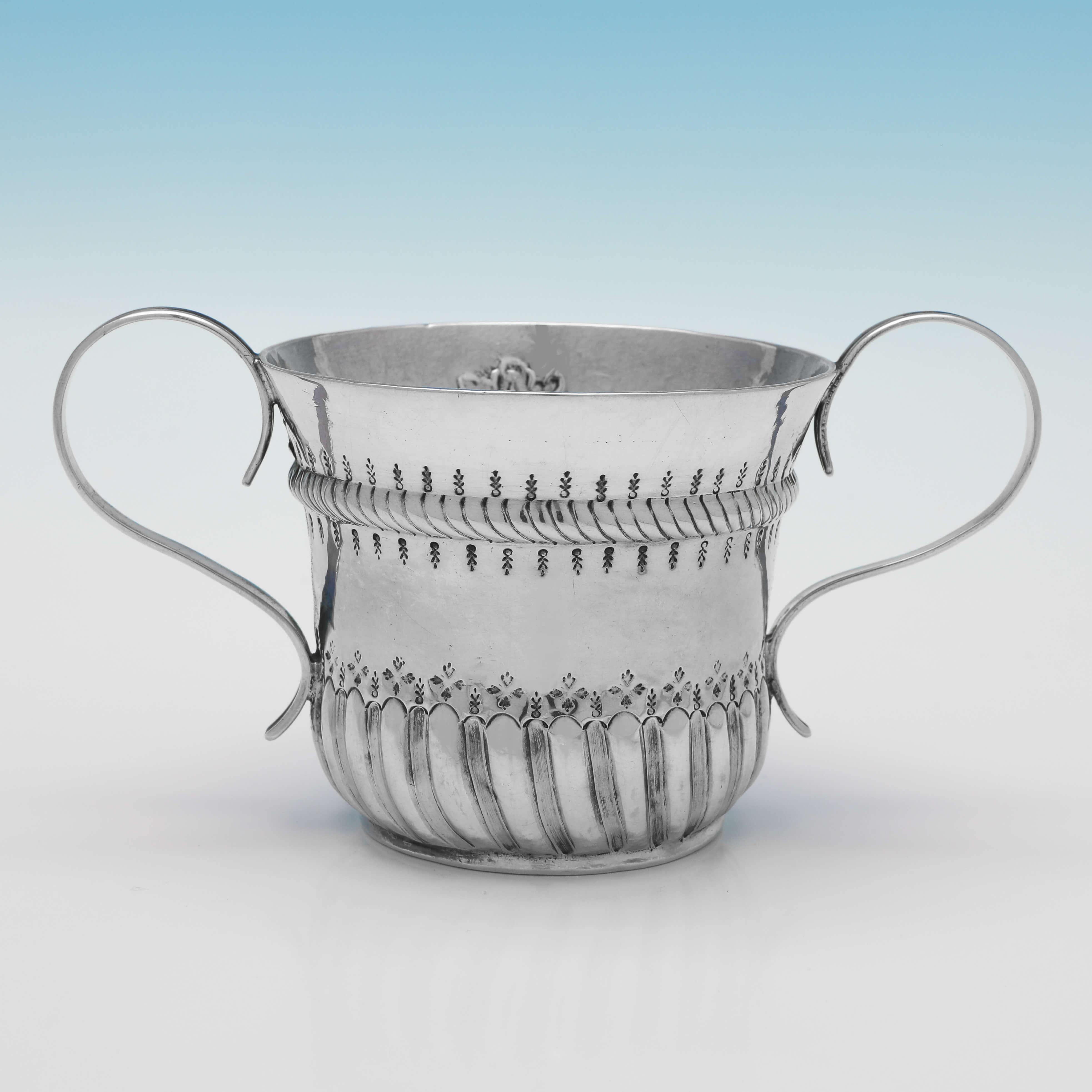Hallmarked in London in 1733 by Gabriel Sleath, this attractive, George II, Antique Sterling Silver Porringer, is of traditional form and design. The porringer measures 3.25