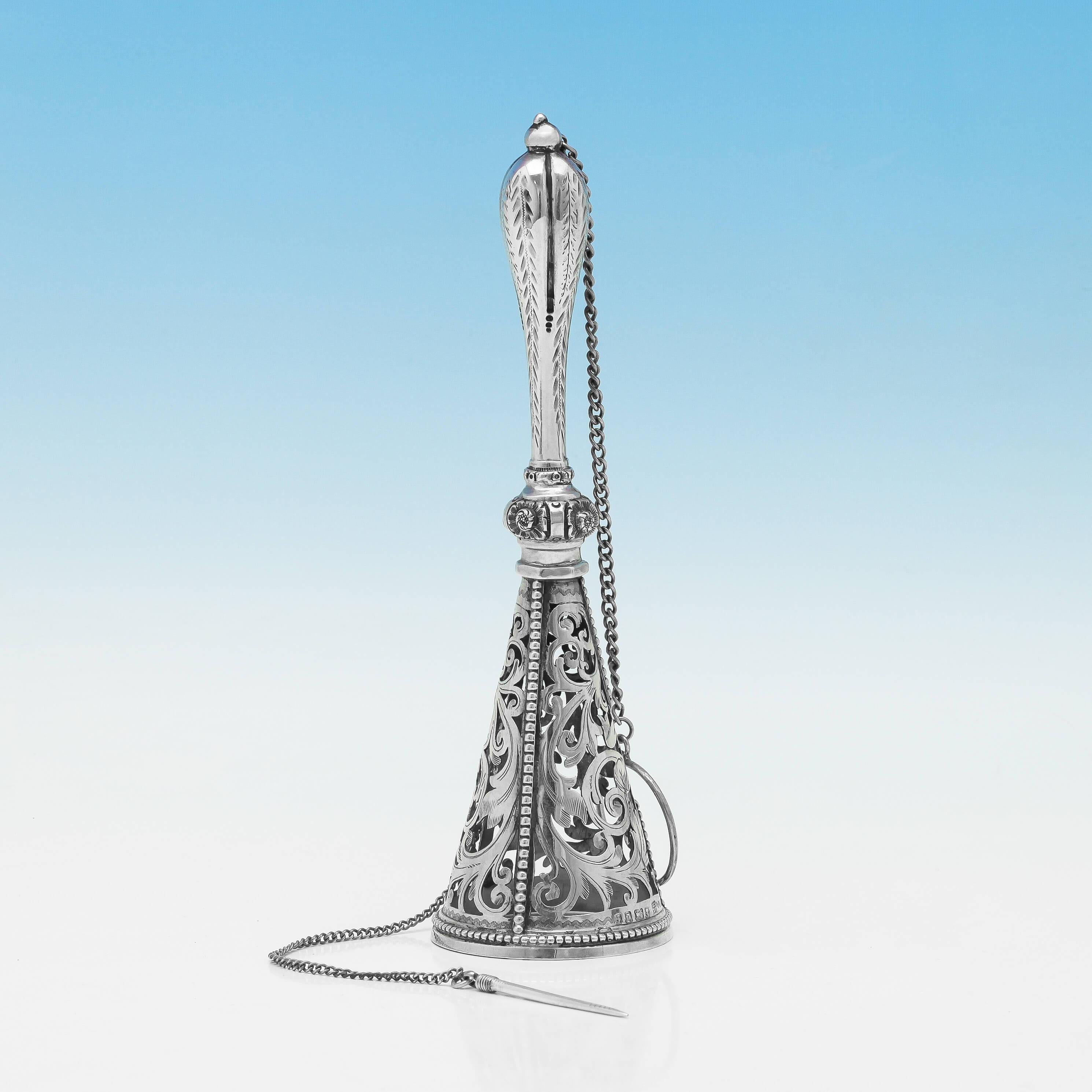Hallmarked in Sheffield, 1878 by Roberts & Belk, this very attractive, Victorian, antique, sterling silver Posey holder, or tussy mussy, has scroll pierced decoration at the top, and beaded detailing throughout. It has an attached chain for the