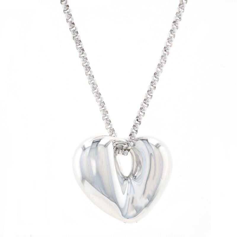 Metal Content: Sterling Silver

Chain Style: Rolo
Necklace Style: Chain
Fastening Type: Spring Ring Clasp
Theme: Puffy Heart, Love
Features: The pendant has a hollow construction for comfortable, all-day wear.

Measurements

Item 1: Pendant
Tall: