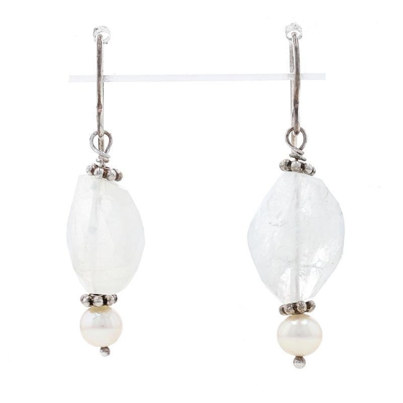 Metal Content: Sterling Silver

Stone Information
Natural Quartz

Freshwater Pearls
Color: White

Style: Dangle
Fastening Type: Fishhook Closures

Measurements
Tall: 1 11/16