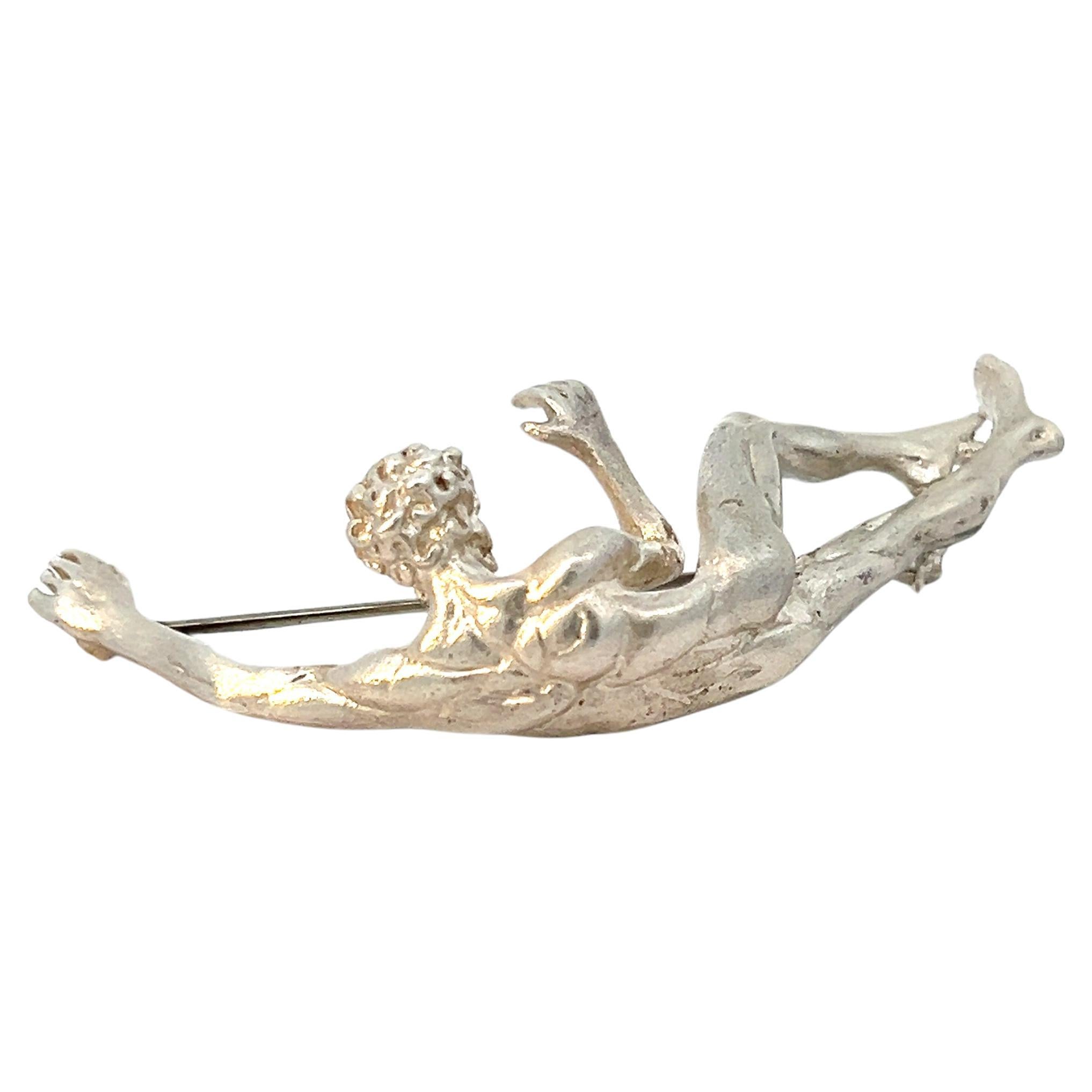 Sterling Silver Reclining Man Lapel Pin Brooch For Sale