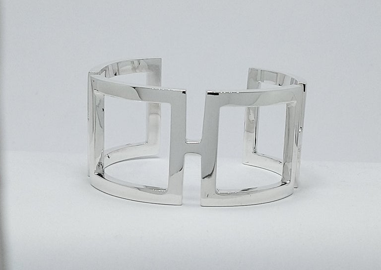Tiffany Designer , Thomas Kurilla  Sterling Silver Rectangle Cuff Bracelet , 3 x 1.5 mm thick x  mm 31 .25 wide. This is one of my early designs.  I was using the simple rectangle in a curved state for the ultimate in expression of sculpture and a
