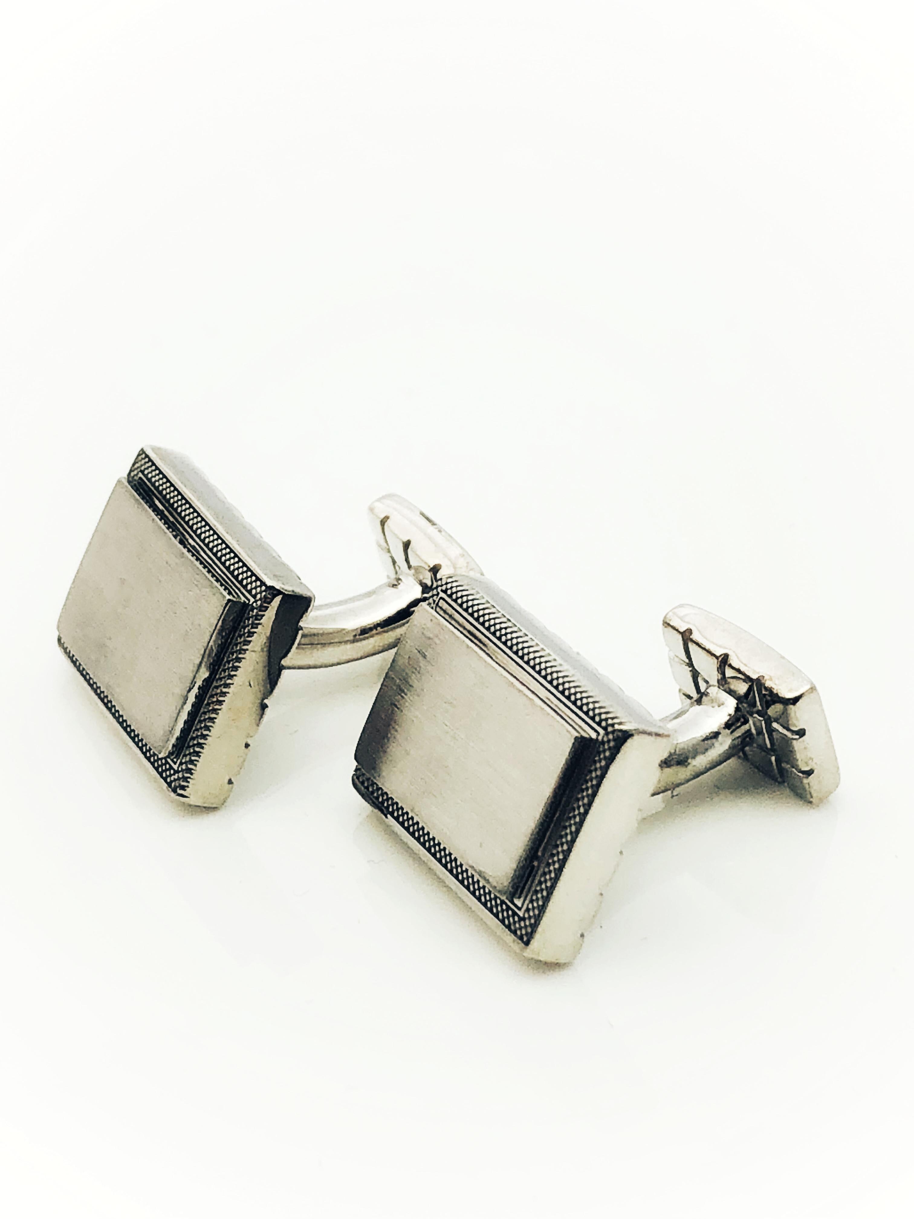 This set of cufflinks would be a wonderful gift for that special someone in your life! Made in Sterling silver, they measure 5/8 inch by 1/2 inch and weigh 26.3 grams. The cufflinks are engrave able. The portion to be engraved is a flat matte finish