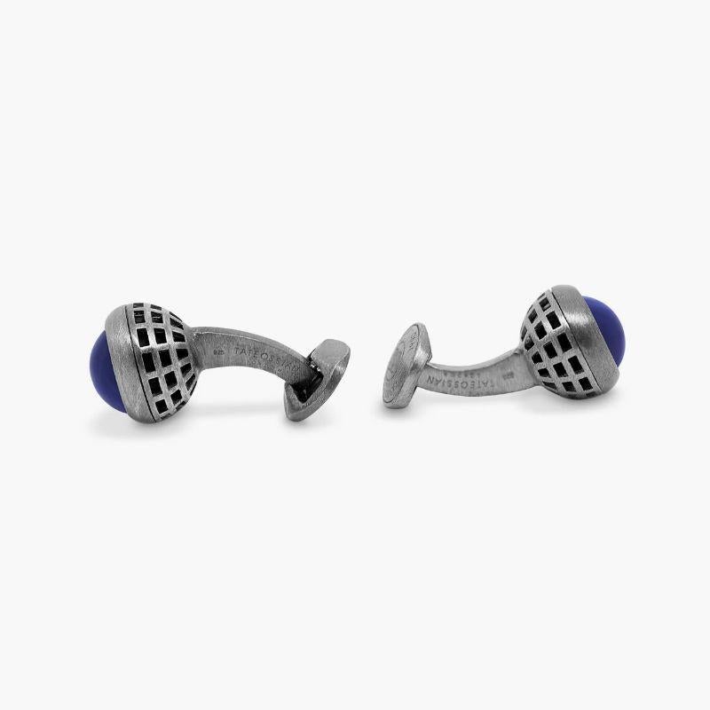 Sterling Silver Revolve Cufflinks with Lapis

Matt sodalite semi-precious stones rotate by touch inside a black rhodium plated sterling silver frame. Sodalite's name refers to the sodium content within the stone and is said to increase creativity
