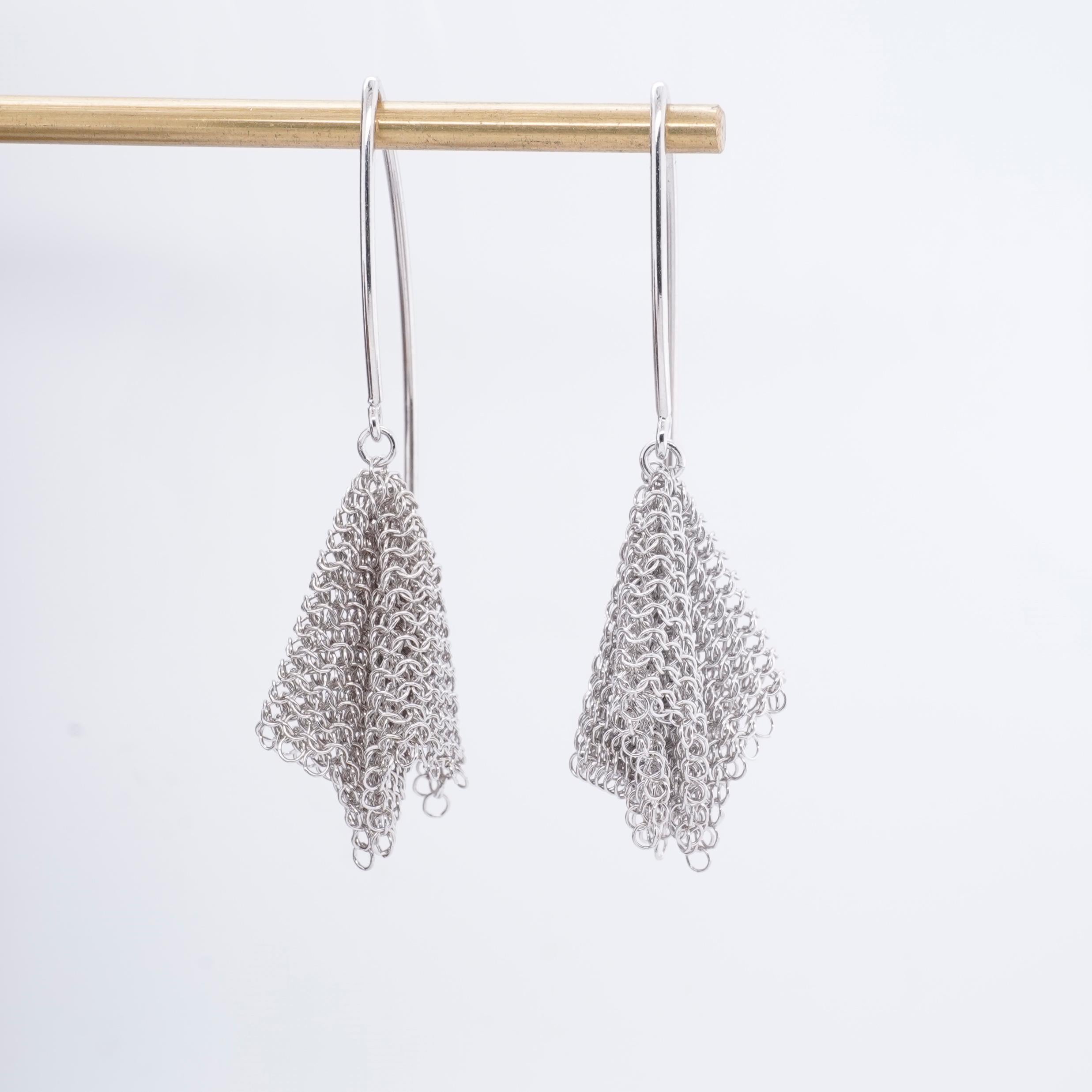 Sterling Silver Rhodium Plate Fine Chainmaille Mesh Earrings by Ashley Childs
Sculpted from vintage chainmeille mesh 1920's purses. (Reclaimed recycled materials.) Lovely drape and movement to these earrings. Rhodium vermeil sterling silver measures