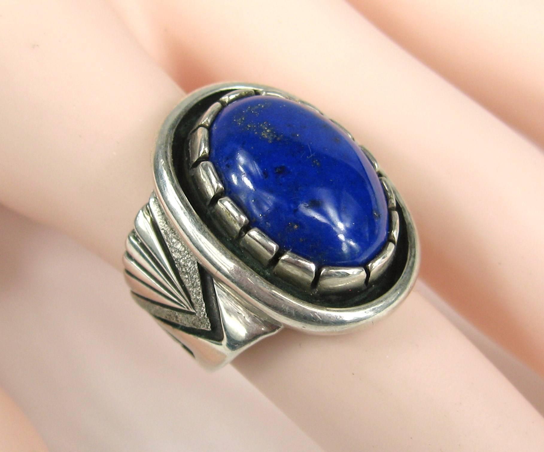 Another wonderful Sterling silver Native American Lapis Shadow Box Ring. Look at the detailing on the shank of this ring. The ring is a size 6 and measures 1.00 in top to bottom x .75 wide. The band graduates from a .59 down to .23 at the back. This
