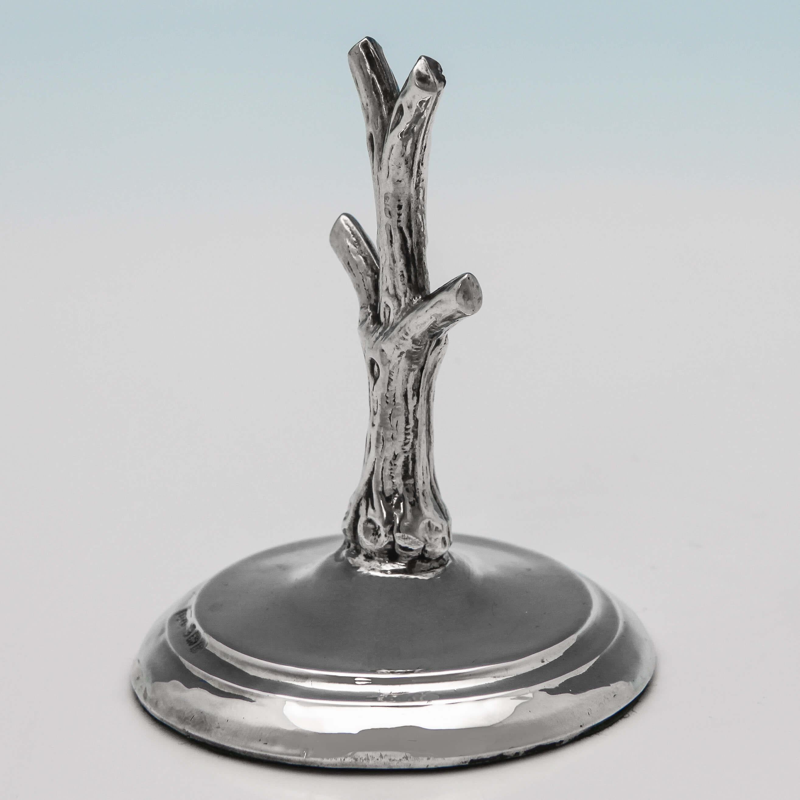 Hallmarked in Birmingham in 1905 by A. E. Goodby & Sons, this novelty, Edwardian antique, sterling silver ring tree, is modelled as a tree trunk, with branches to hold your rings. The ring tree measures 3.25