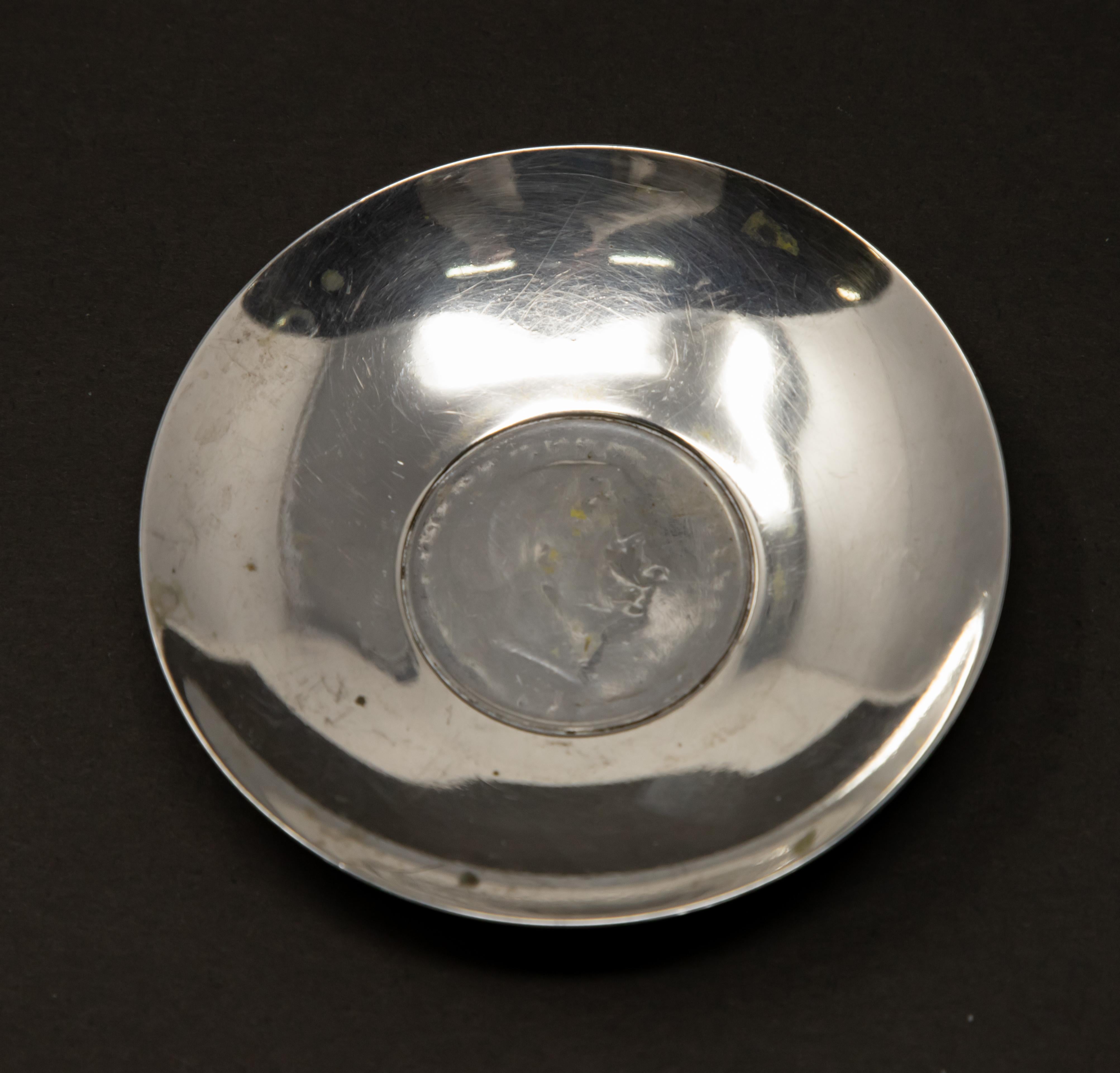 Offering this sterling silver coin dish with Romanian Coin.