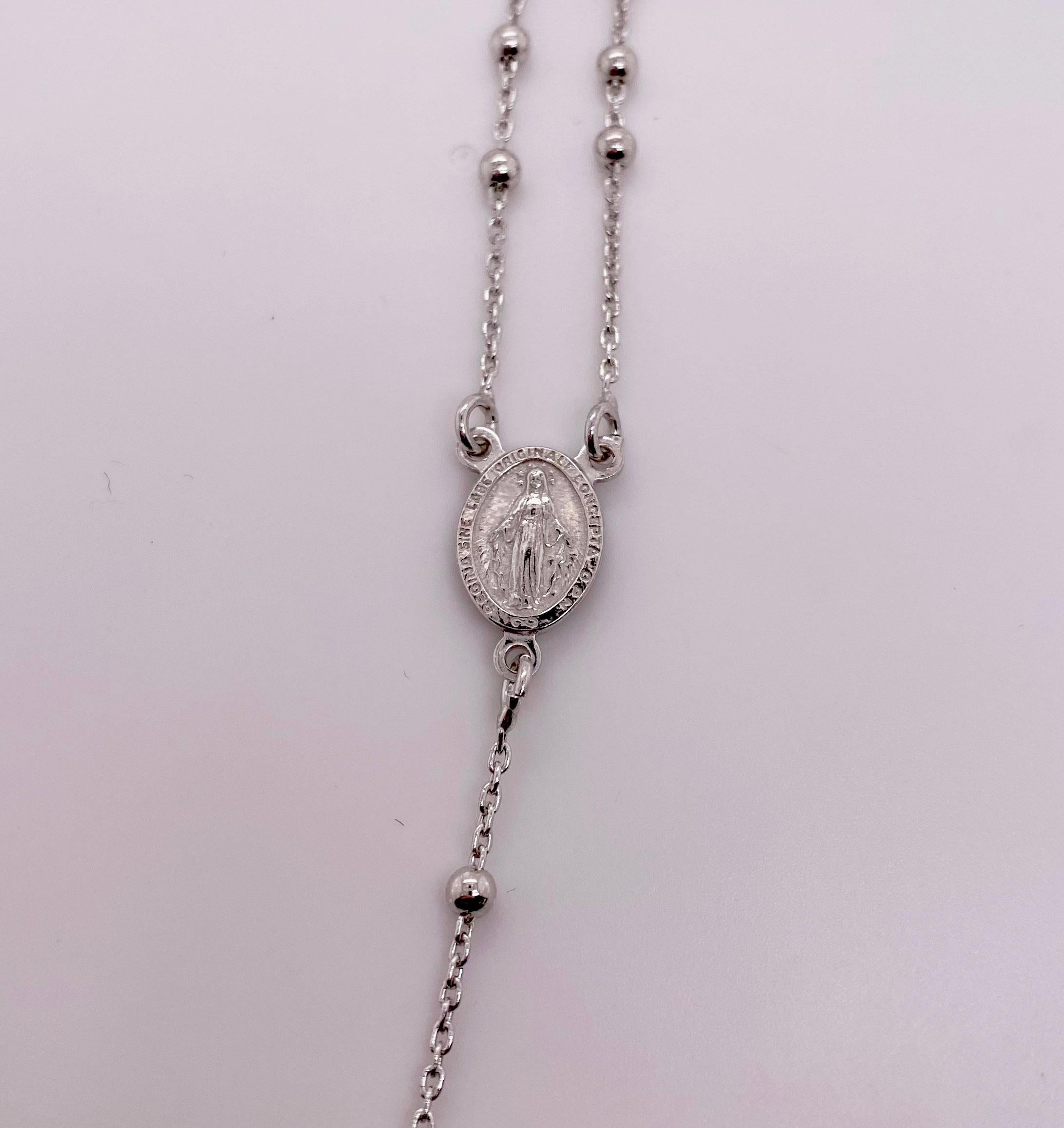 Catholic Rosary Necklace in Sterling Silver (92.5% pure silver). This necklace is your perfect prayer and it can be worn around your neck. There is a gorgeous cross at the end of the necklace.
The details for this beautiful necklace are listed